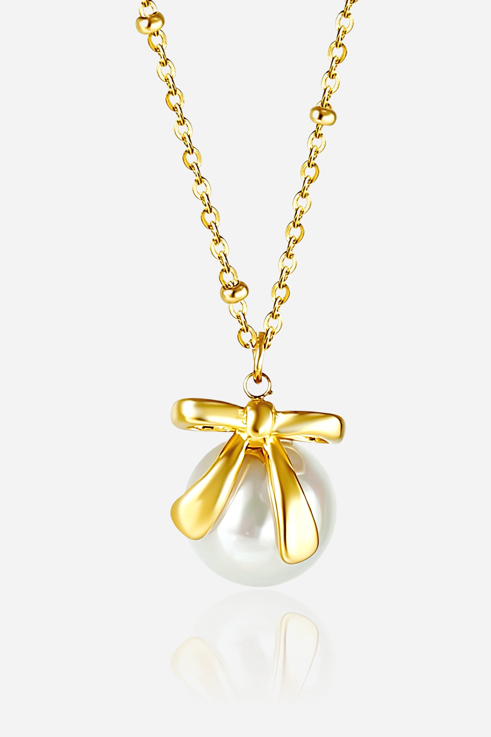GLISTIA Aurelia Bow Pearl Pendant Necklace with PVD 18K gold plated bow design and polished pearl drop.