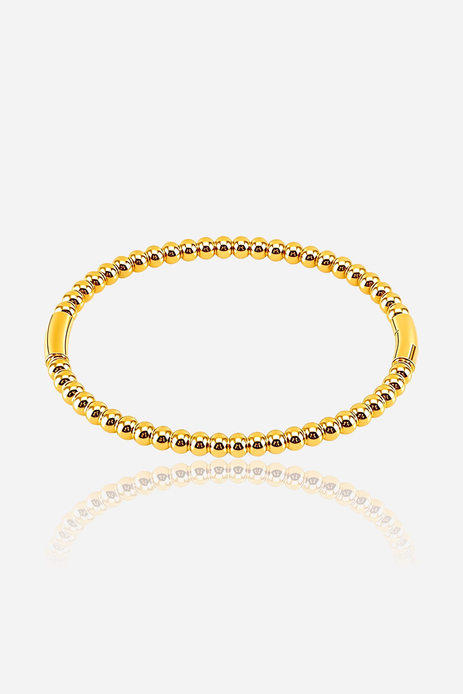 Front view of Beaded Sphere Bangle crafted from stainless steel with a lustrous 18K PVD gold plated finish, featuring a continuous round-bead design - GLISTIA.