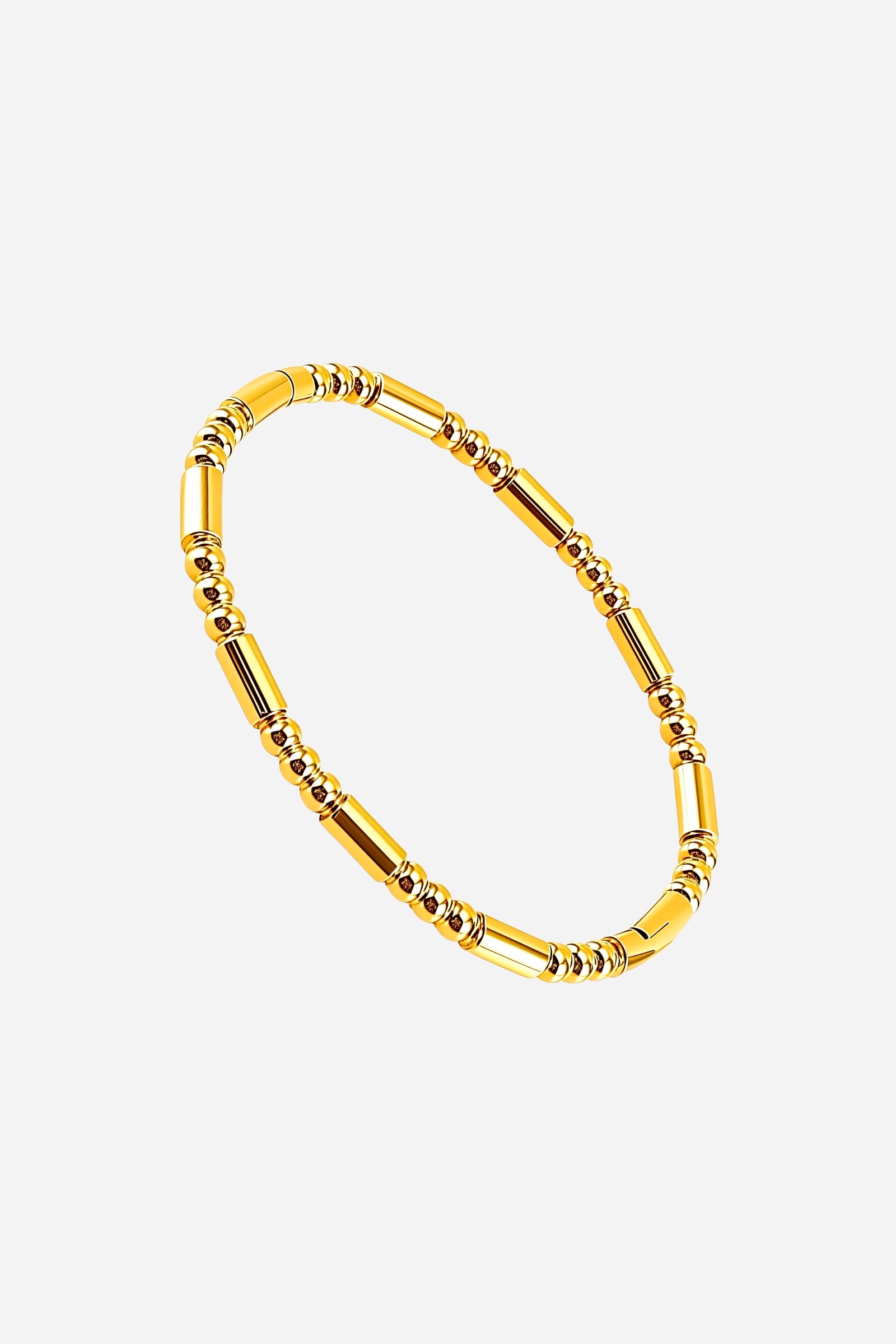 Top view of the Beaded Tube Bangle featuring its continuous gold-tone tubular and rounded bead structure for a modern elegant look - GLISTIA.