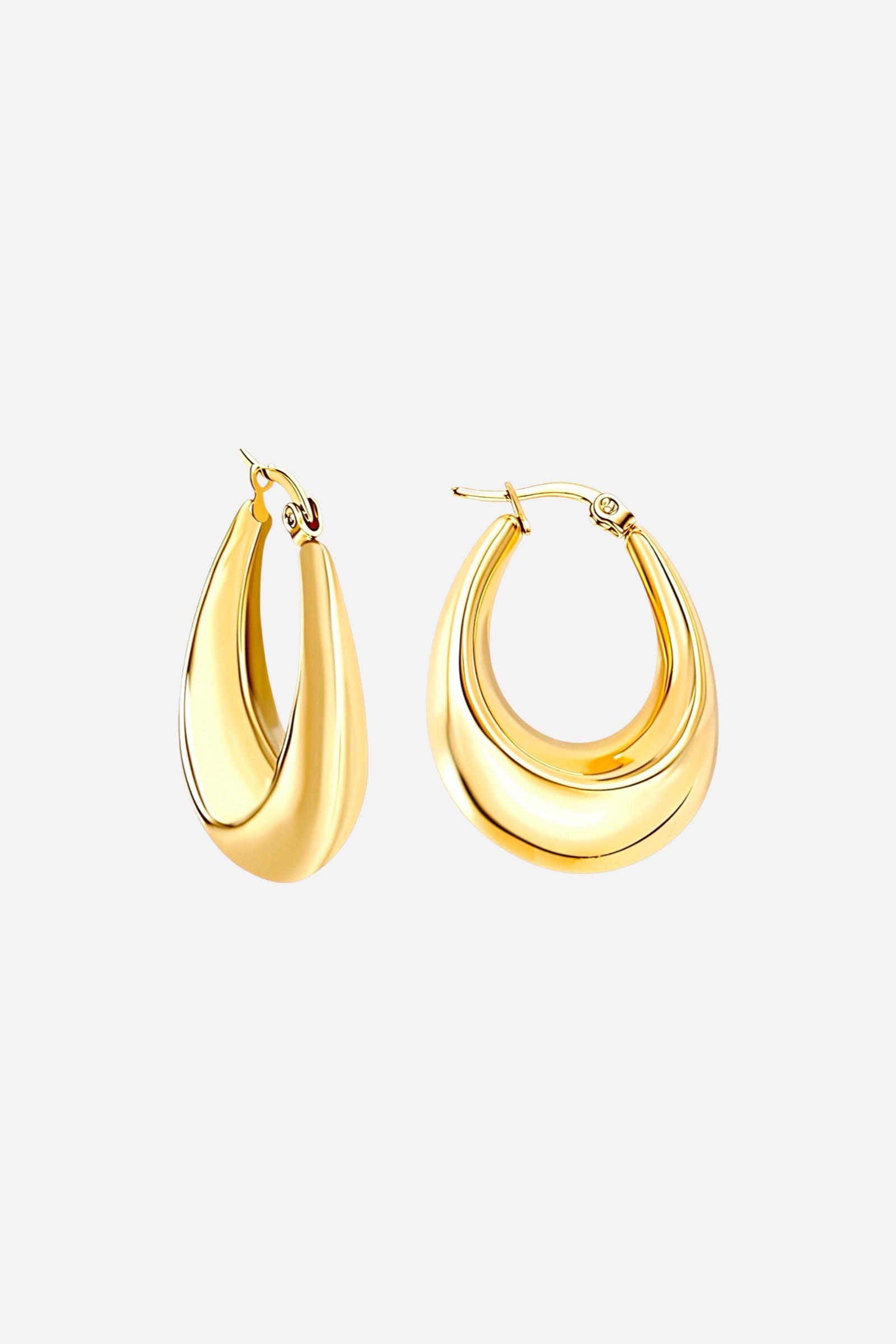 High-polish bold crescent hoop earrings crafted from stainless steel with a luxurious PVD 18K gold plated finish elegant curved silhouette reflecting modern sophistication, GLISTIA.