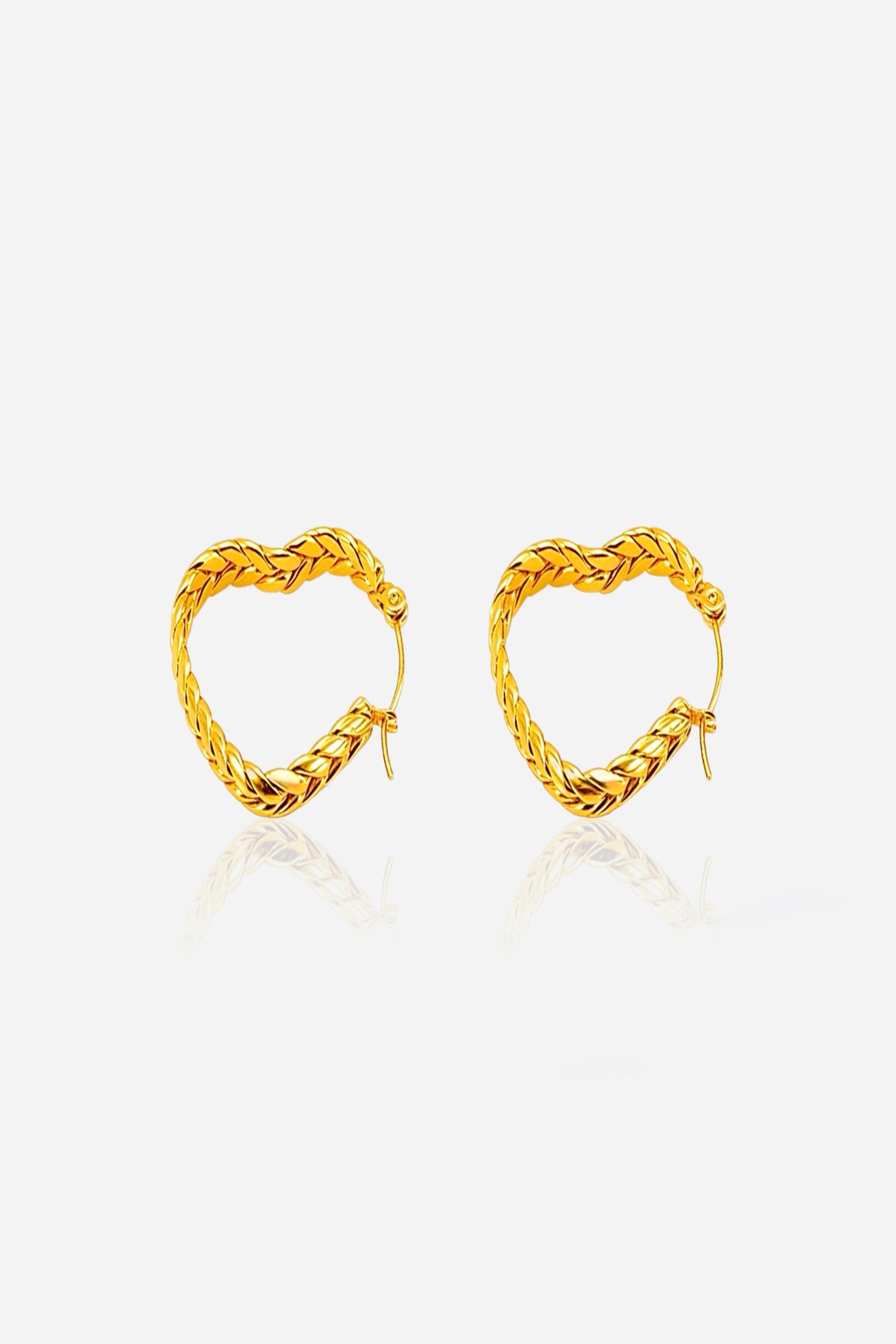 Front view braided heart hoop earrings crafted in stainless steel with a radiant 18K gold plated finish, showcasing a twisted braid texture shaped into a sleek heart silhouette – GLISTIA
