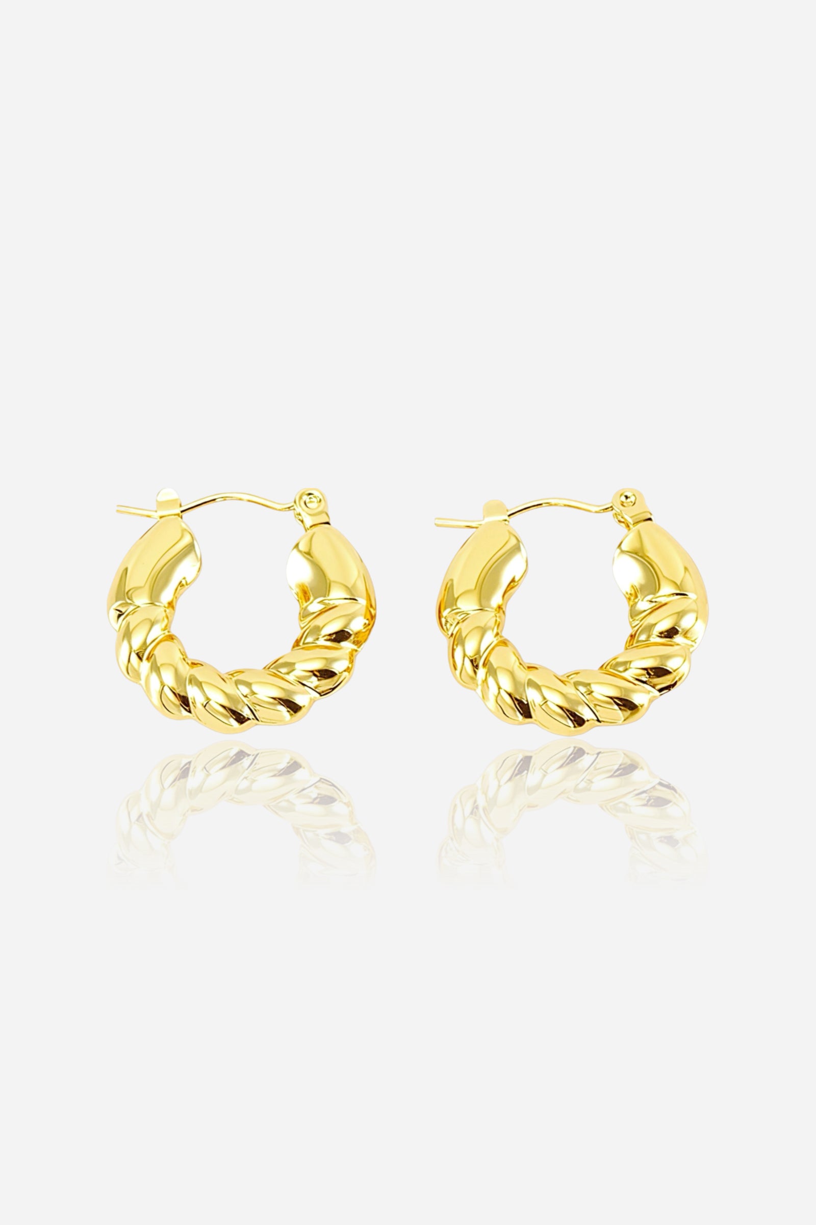 Front view of braided twist hoop earrings made from stainless steel with a radiant PVD 18K gold plated finish, showcasing a sculpted interwoven texture and smooth reflective surface – GLISTIA.