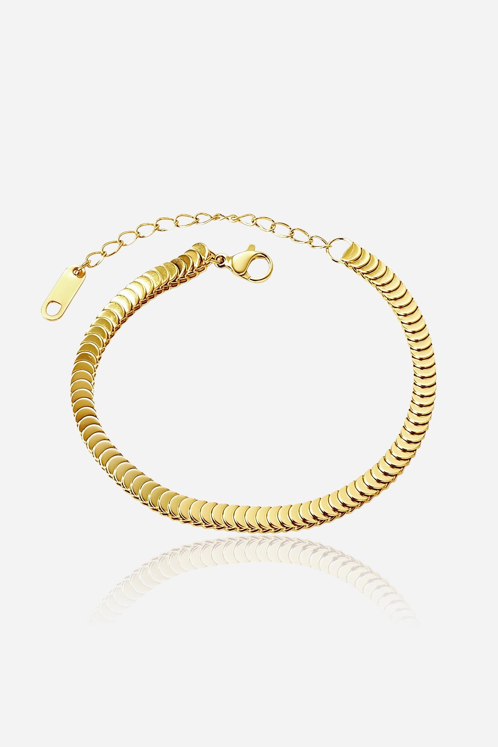 GLISTIA Celeste disc chain bracelet in PVD 18K gold plated stainless steel shown from the front with polished disc links.