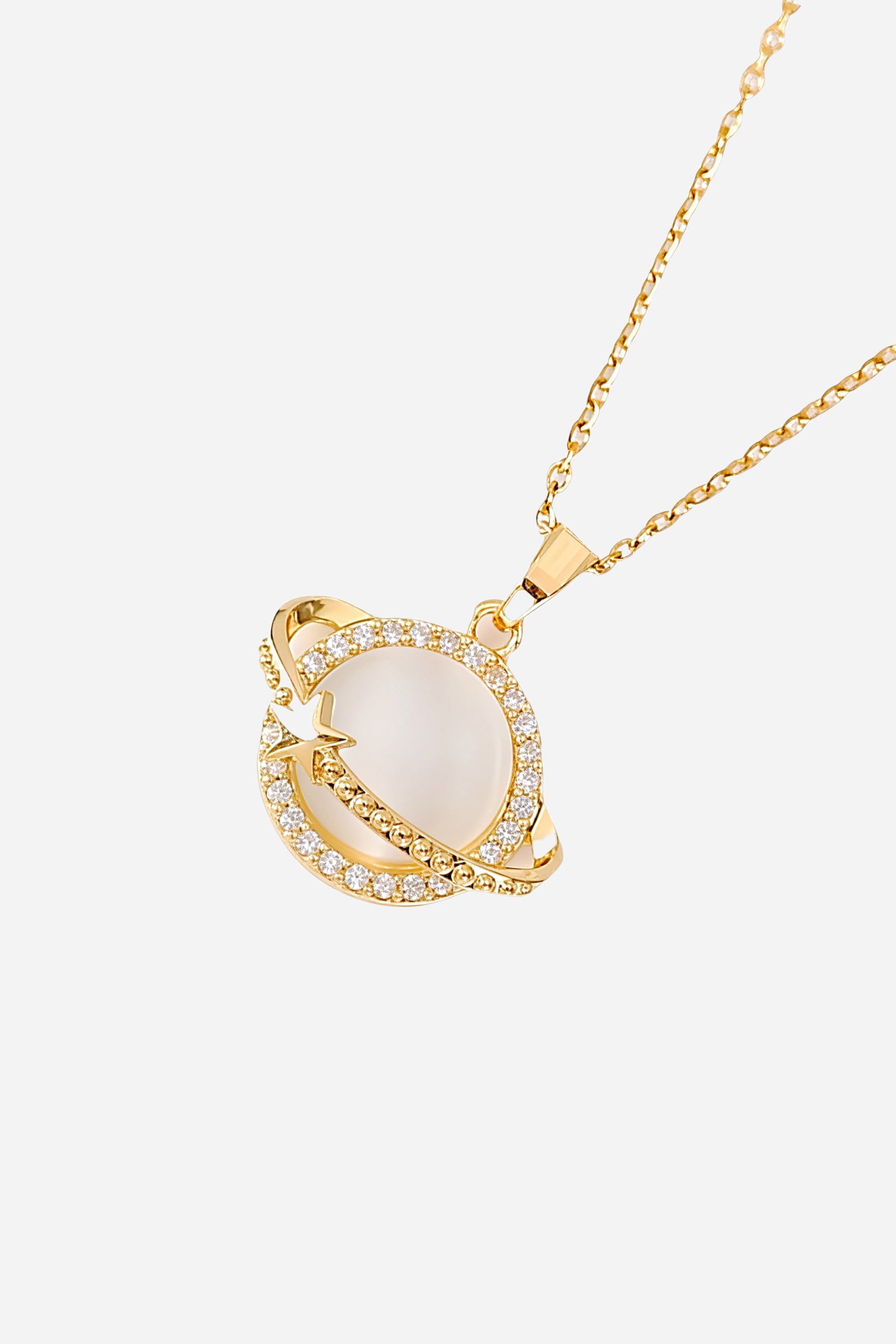 Side view image of GLISTIA 18K gold-plated celestial orbit necklace with crystal detailing.