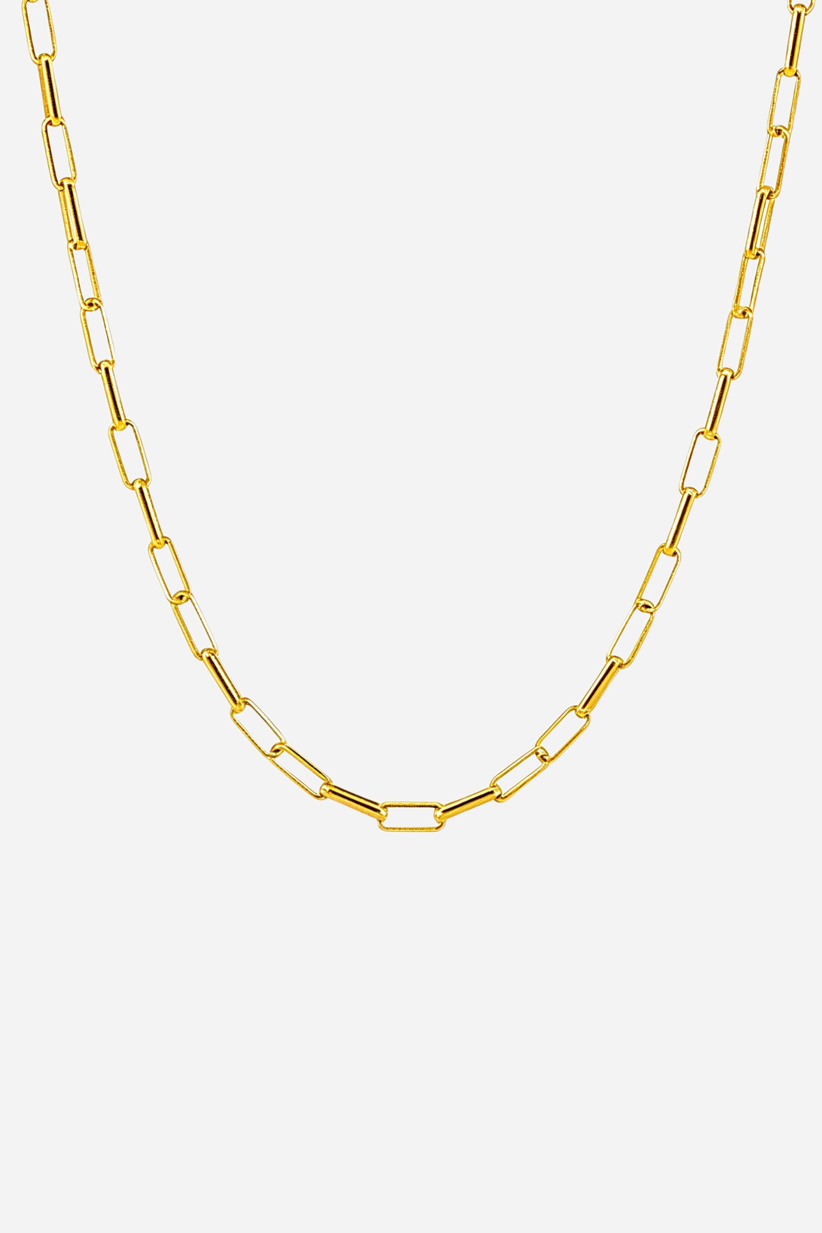 Side-angle view of the GLISTIA classic box link necklace highlighting the elongated rectangular links in 18K gold-plated stainless steel.