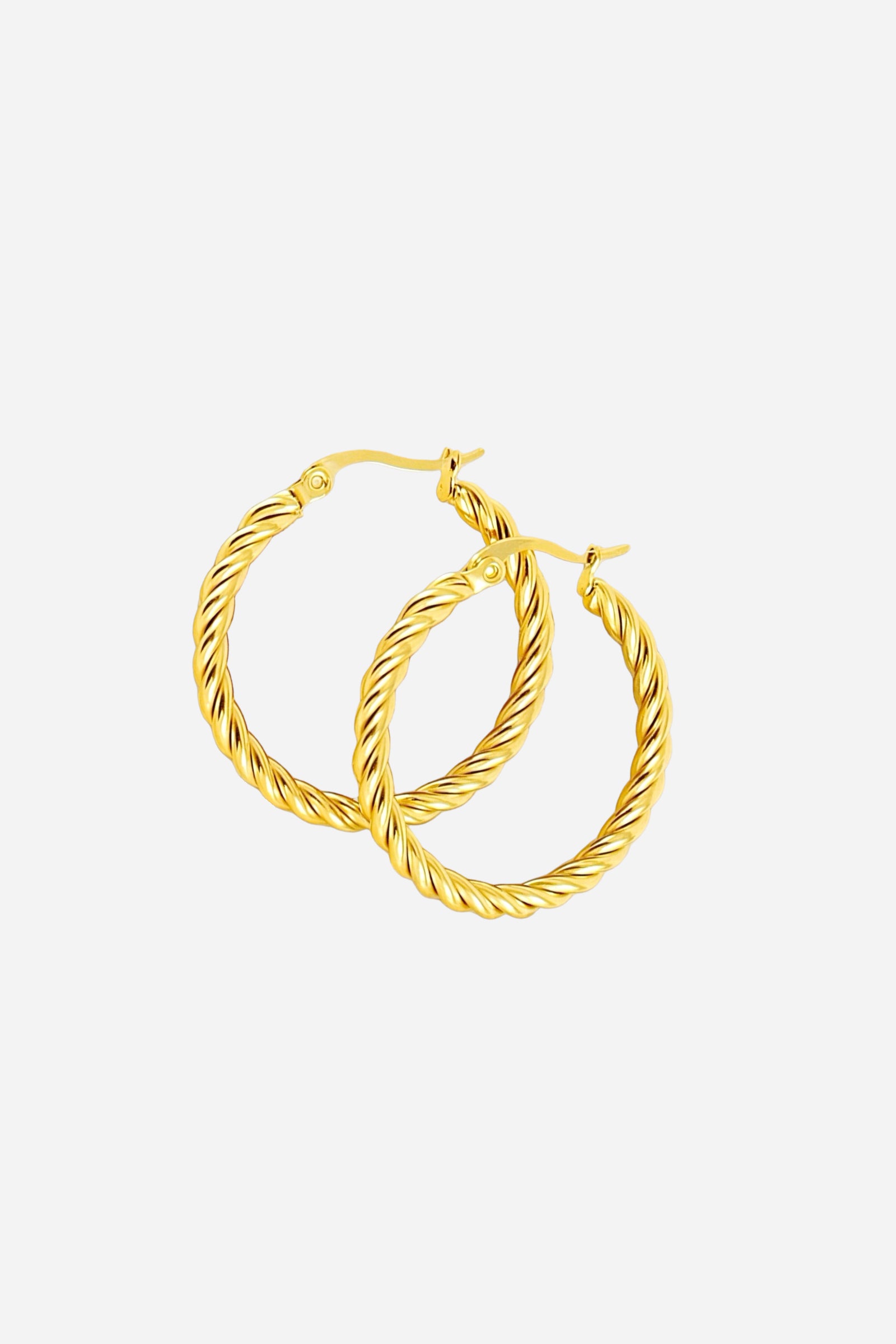 Side view of classic twisted rope hoop earrings made from stainless steel with a polished PVD 18K gold plated finish, featuring intertwined rope detailing and a smooth circular shape – GLISTIA.