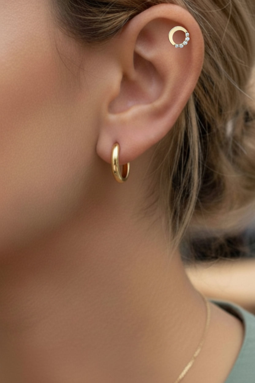 Crescent crystal moon stud earring in 18K PVD gold plated stainless steel with shimmering crystals, single earring