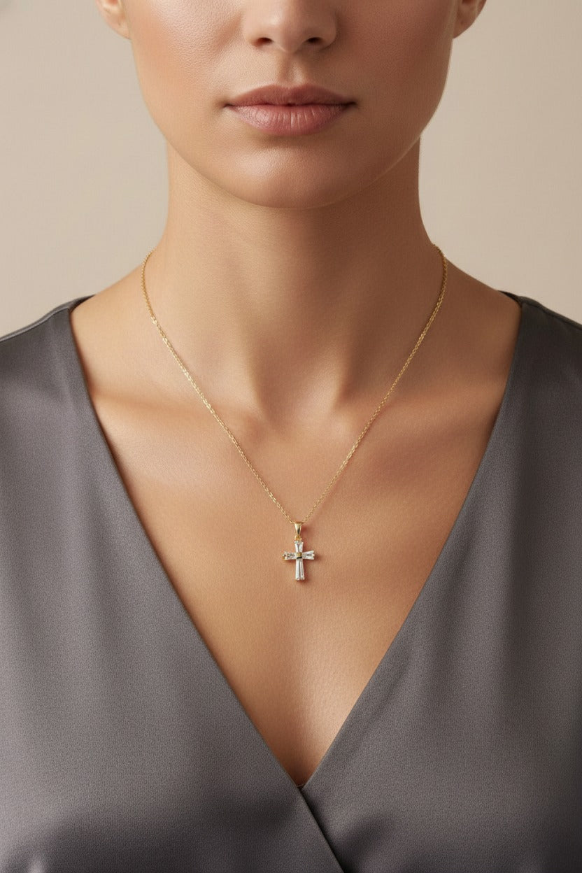 Crystal cross pendant necklace in 18K PVD gold plated stainless steel with faceted crystal design