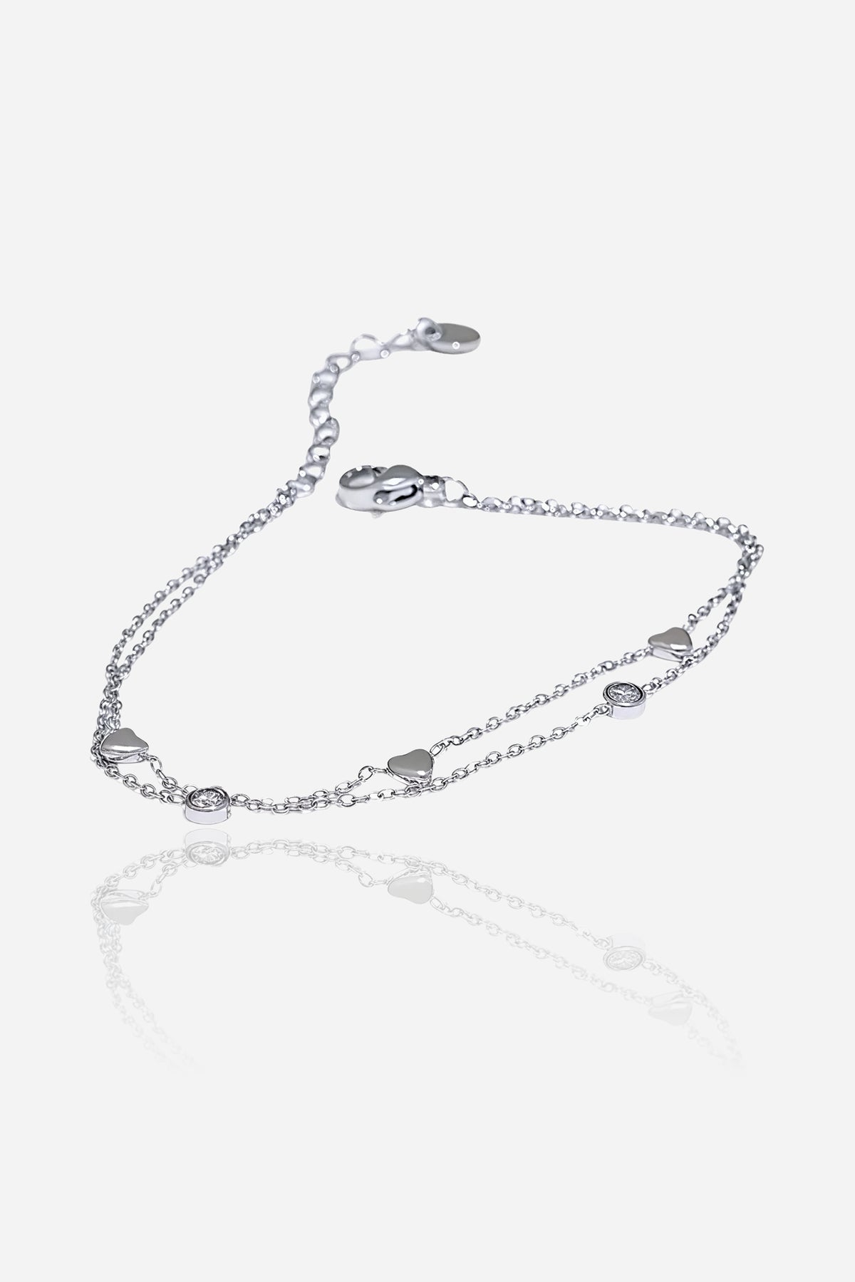 GLISTIA double layer heart and crystal chain bracelet in polished silver stainless steel shown from the front.