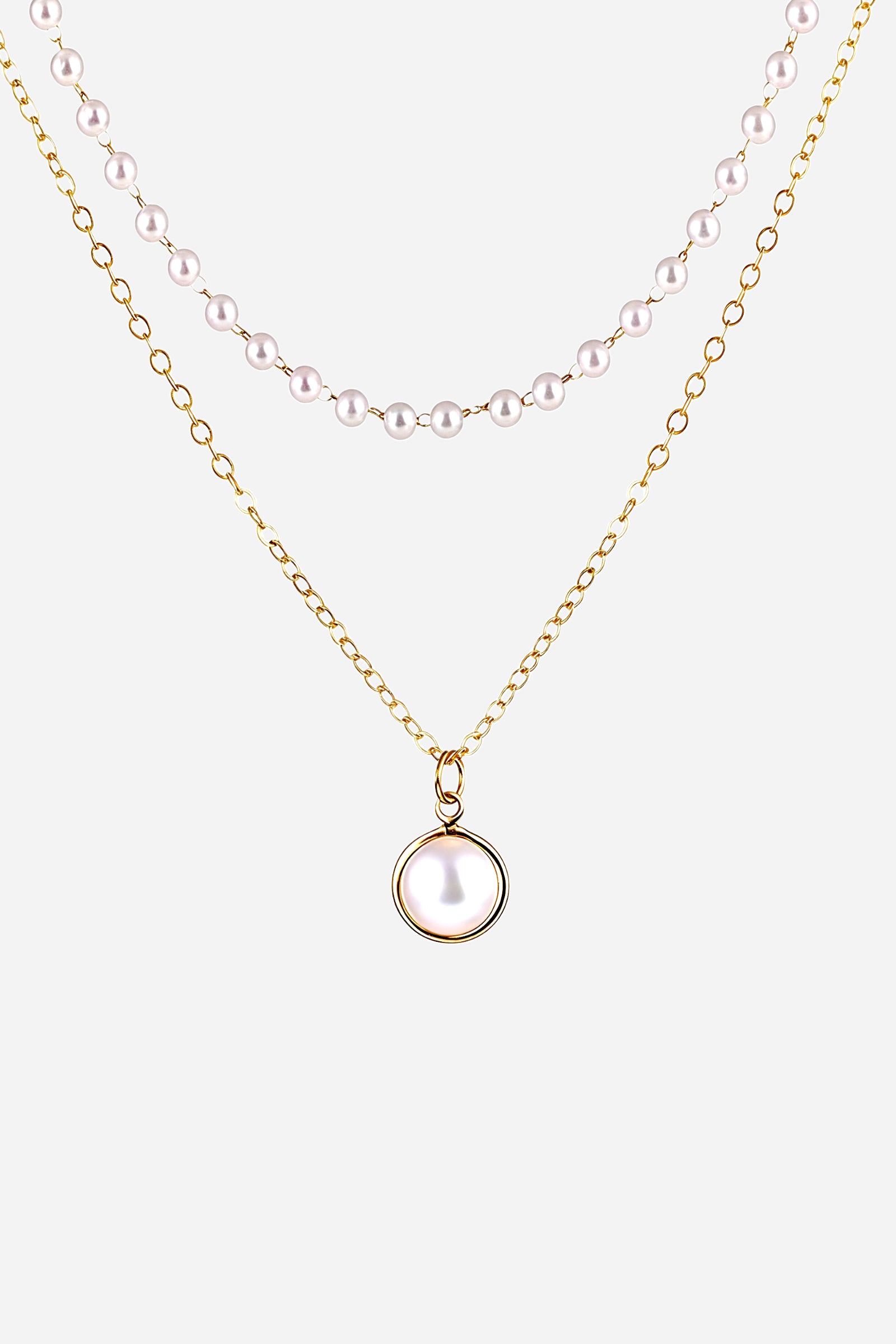Top view of double layer pearl pendant necklace with PVD 18K gold plated stainless steel chain and white pearl beads – GLISTIA.