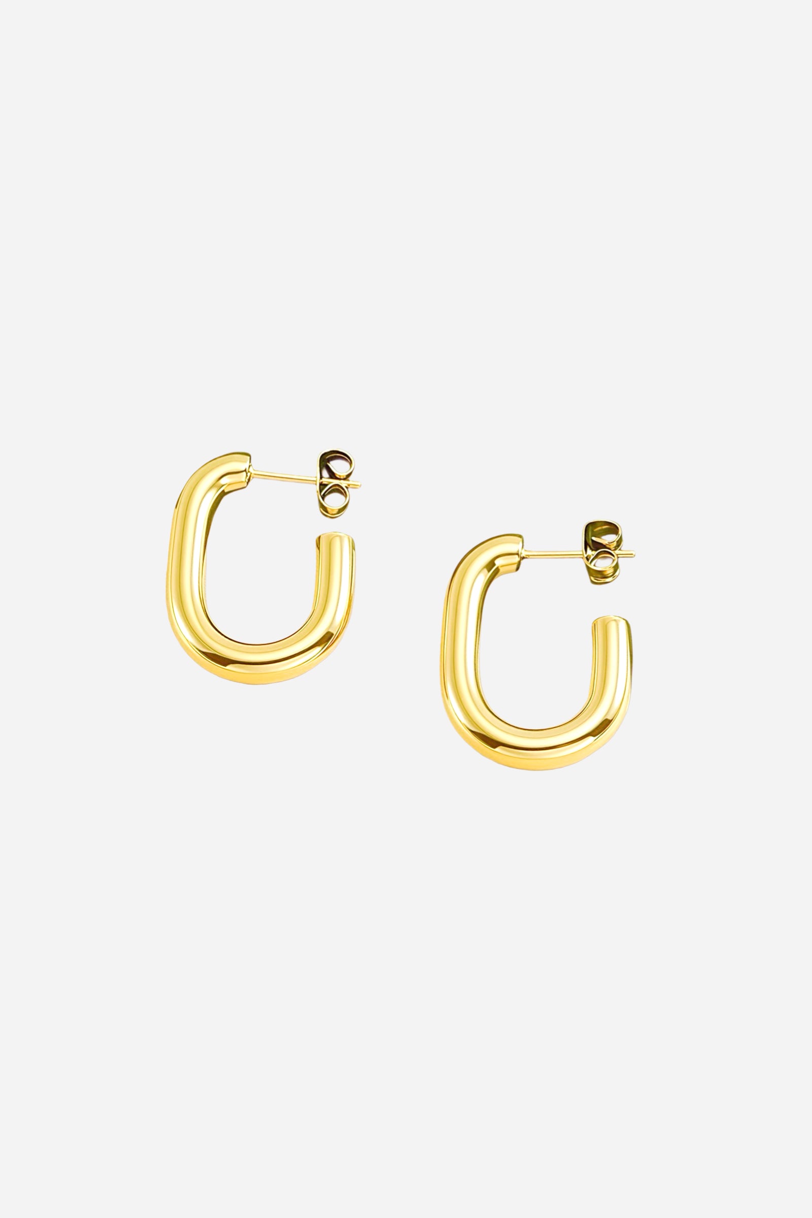 Side view of Elara gold hoop earrings in 18K PVD gold plated stainless steel with a polished curved finish – GLISTIA jewellery