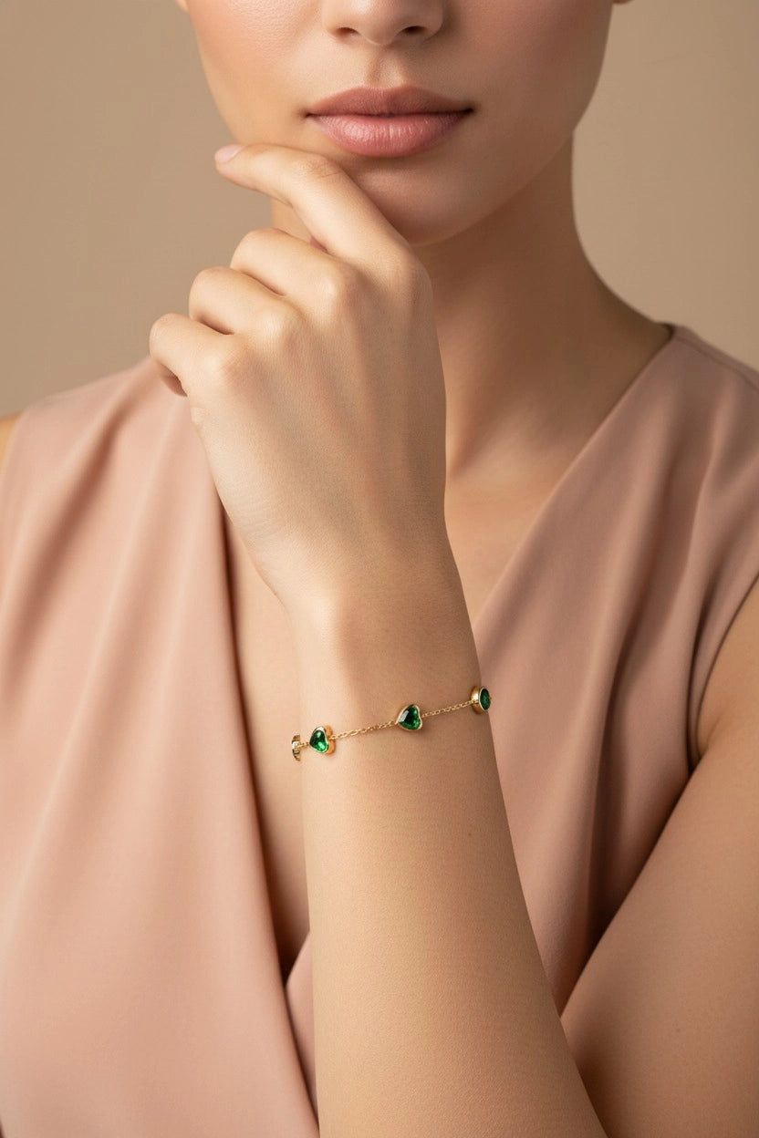 Emerald Heart Charm Chain bracelet in 18K PVD gold plated stainless steel with elegant green heart stone detailing