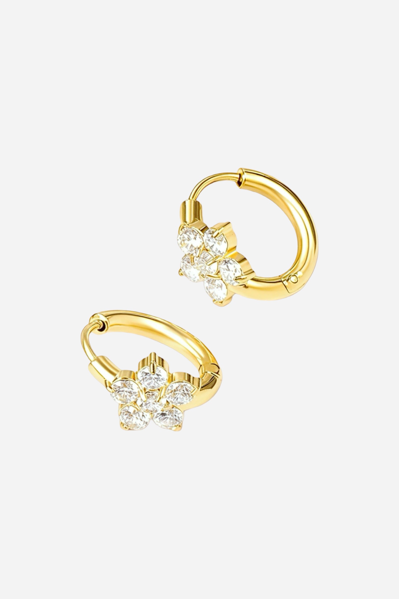 Side view of gold hoop earrings crafted from stainless steel with PVD 18K gold plating, featuring a sparkling flower-shaped cubic zirconia cluster – GLISTIA.