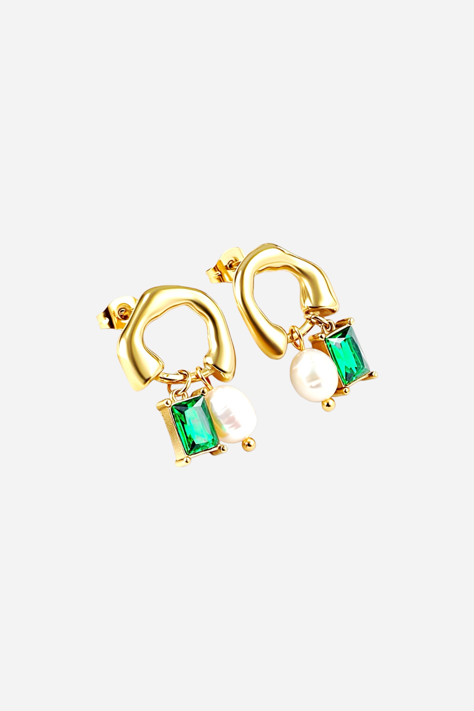 Close-up of geometric drop earrings featuring an emerald-green rectangular crystal and imitation pearl charm, crafted from stainless steel with a smooth PVD 18K gold-plated finish – GLISTIA.