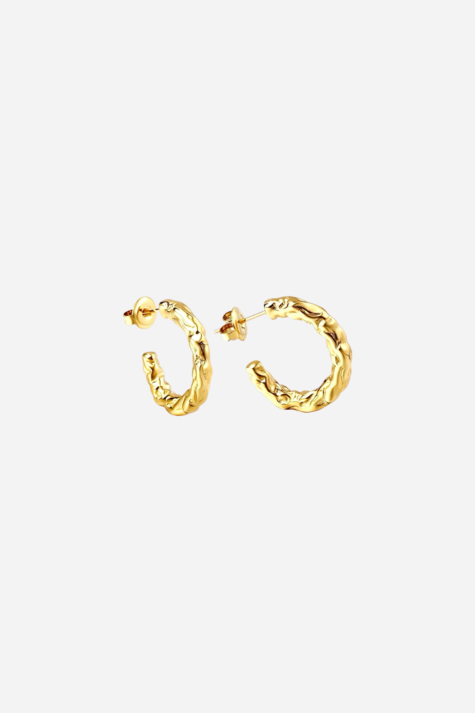 Side view of gold molten textured hoop earrings in PVD 18K gold plated stainless steel – organic sculptural design by GLISTIA