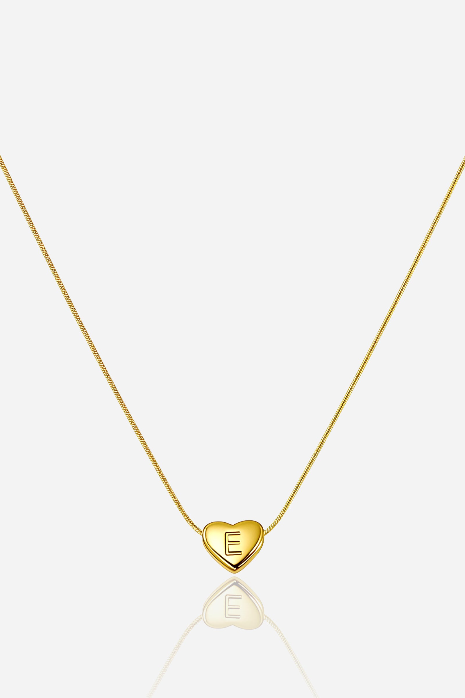 Gold-plated heart initial ‘E’ necklace with smooth finish on snake chain, PVD 18K gold plated stainless steel jewellery – GLISTIA
