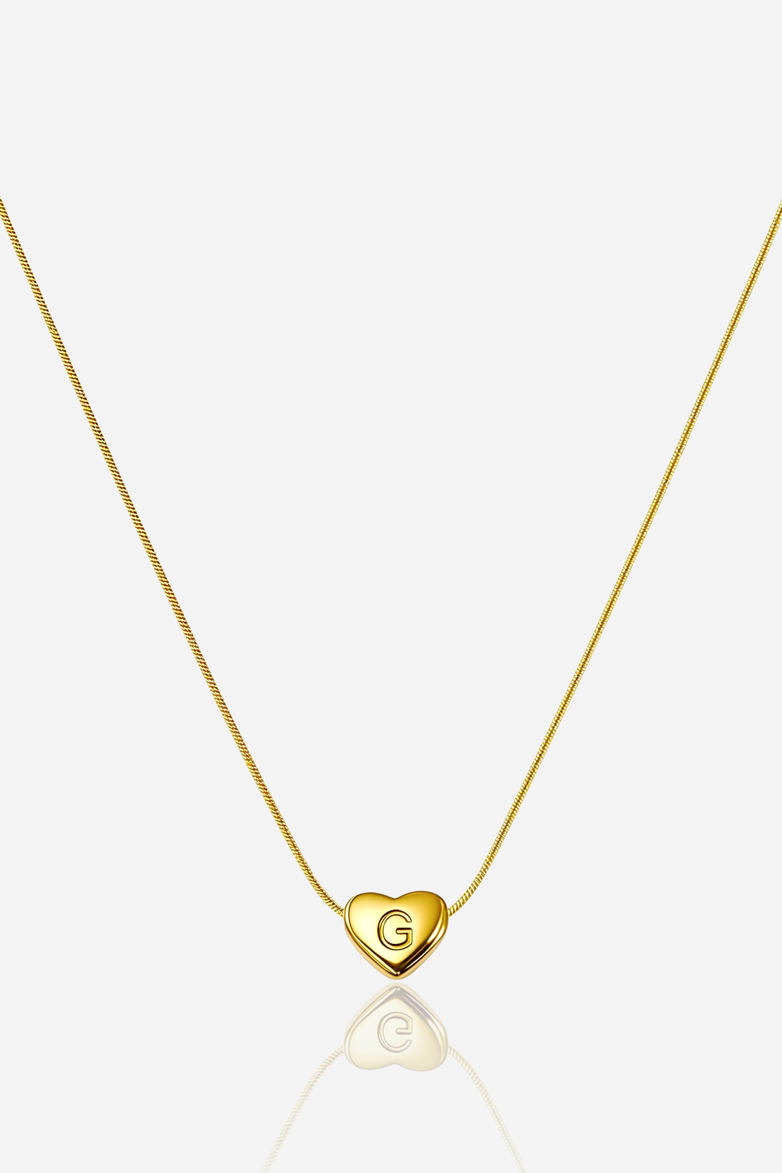 Gold-plated heart initial ‘G’ necklace with engraved pendant on a snake chain, PVD 18K gold plated stainless steel – GLISTIA