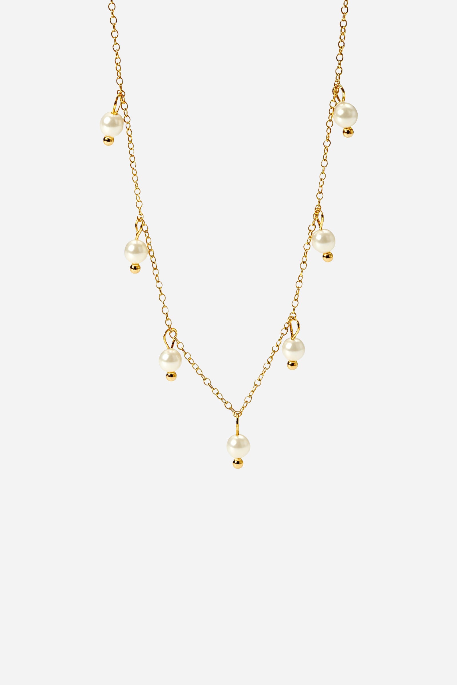 Front view of GLISTIA Golden Droplet Pearl Necklace with multiple pearl charms.