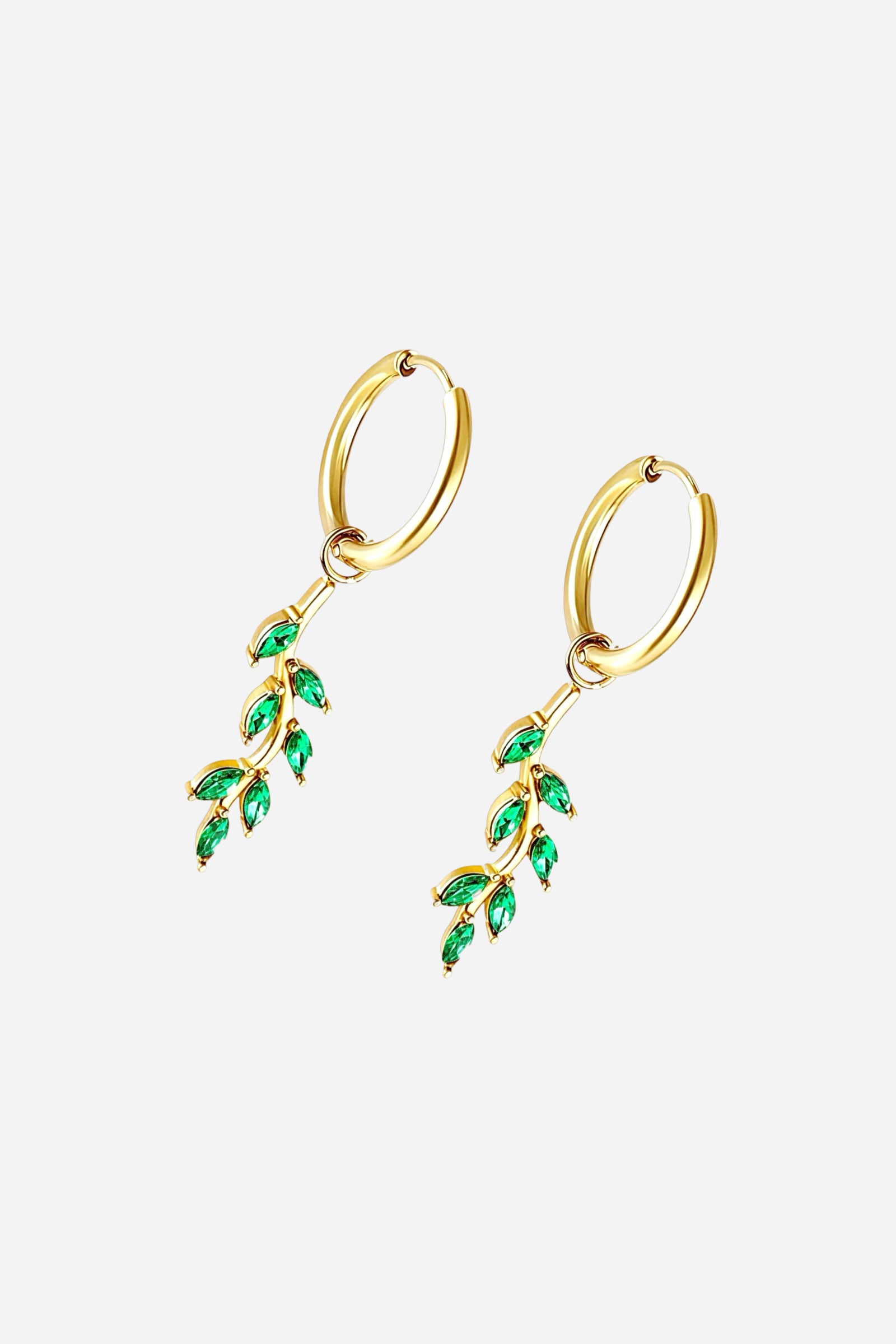 Side view green leaf dangle hoop earrings crafted from stainless steel with a PVD 18K gold plated finish, featuring cascading leaf motifs adorned with sparkling green cubic zirconia crystals – GLISTIA.