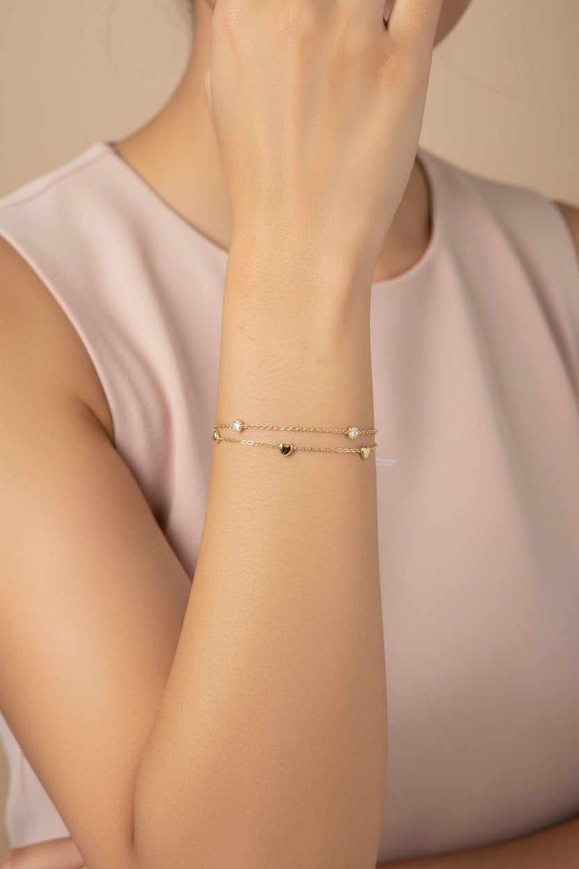 Heart Duo Chain bracelet in 18K PVD gold plated stainless steel with elegant heart link detailing