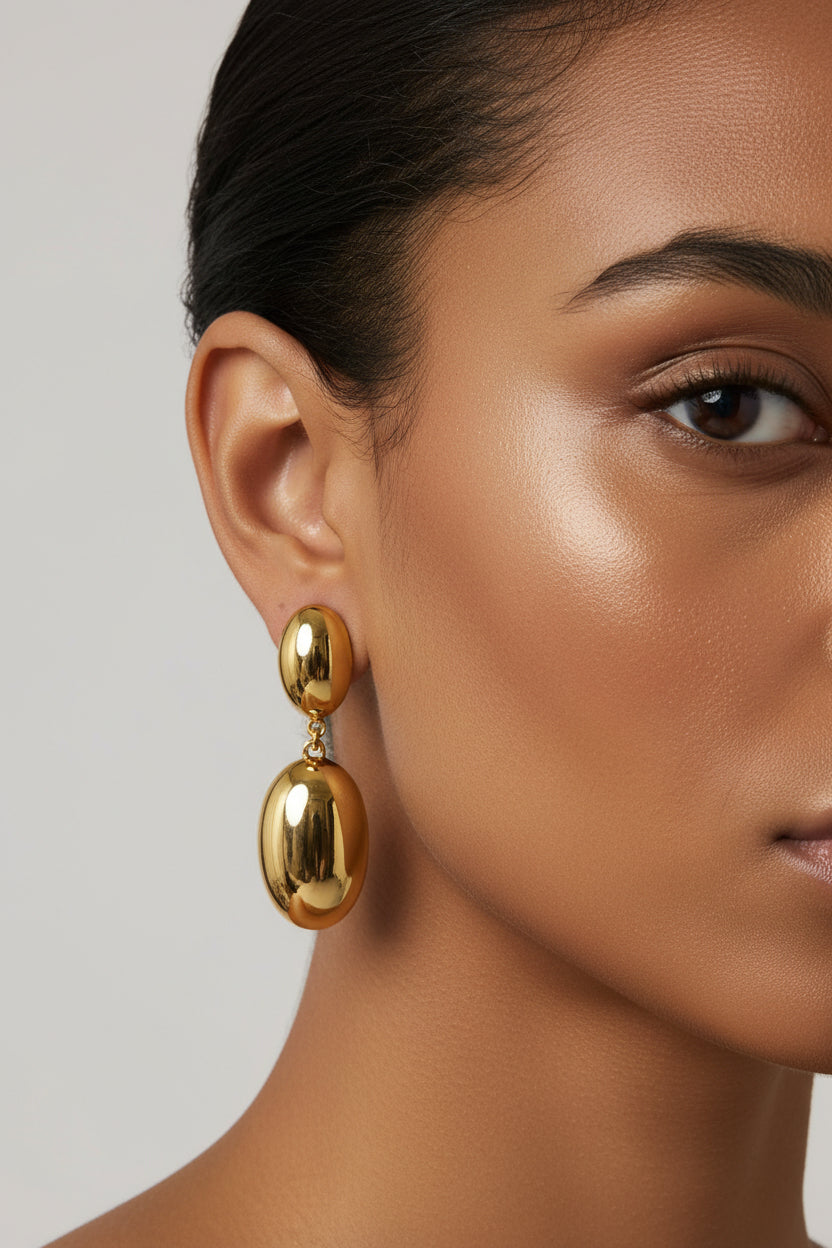 Front view of long oval drop earrings in 18K PVD gold plated stainless steel with double oval design