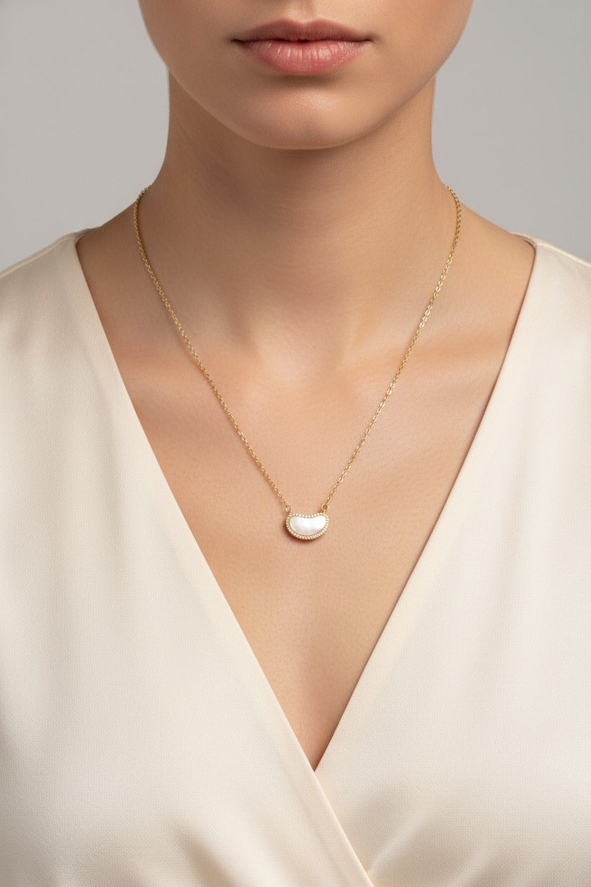 Luna bean pendant necklace in 18K PVD gold plated stainless steel with cubic zirconia detailing