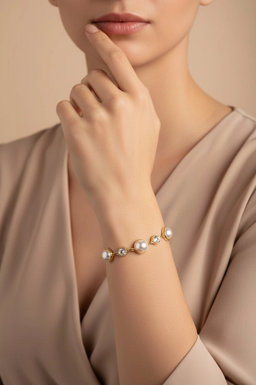 Lustre Pearl gold bracelet in 18K PVD gold plated stainless steel with elegant pearl detailing