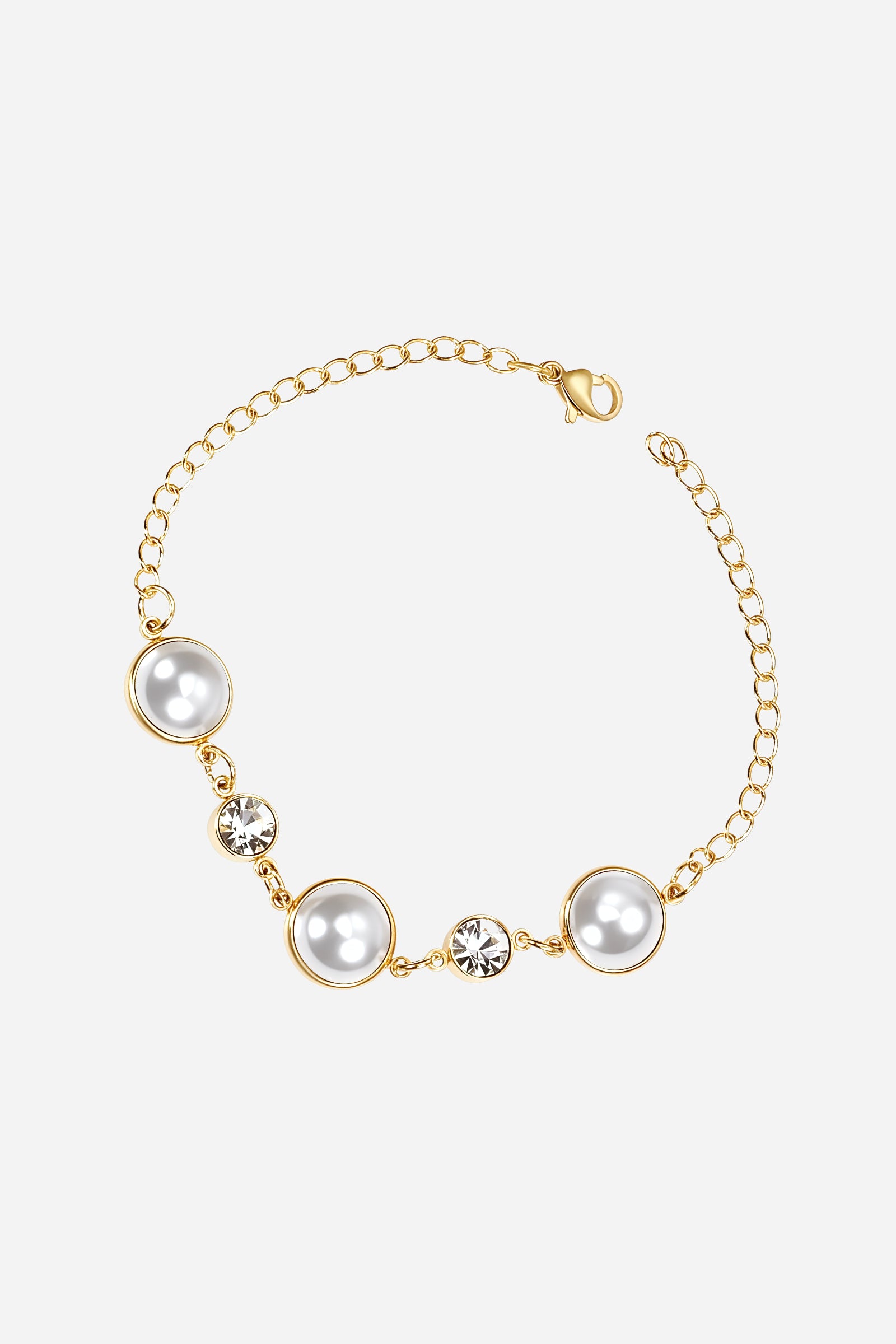 Top-view of GLISTIA’s Lustre Pearl bracelet featuring bezel-set pearls and small sparkling round crystals.