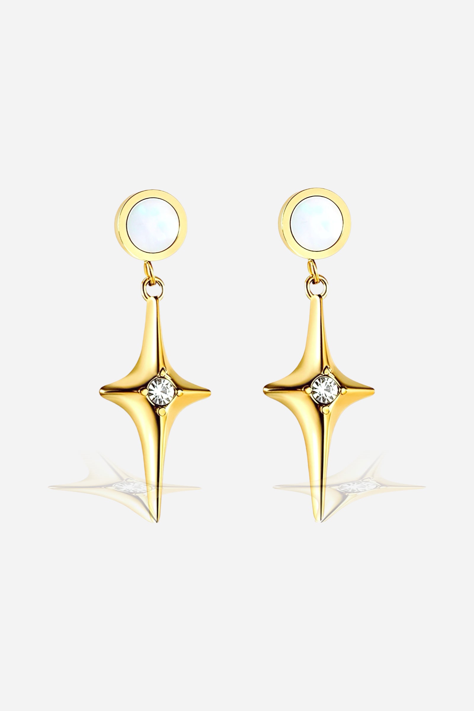 Front view of North Star drops earrings crafted from stainless steel with a polished PVD 18K gold-plated finish, featuring a star-shaped drop and clear crystal accent – GLISTIA.