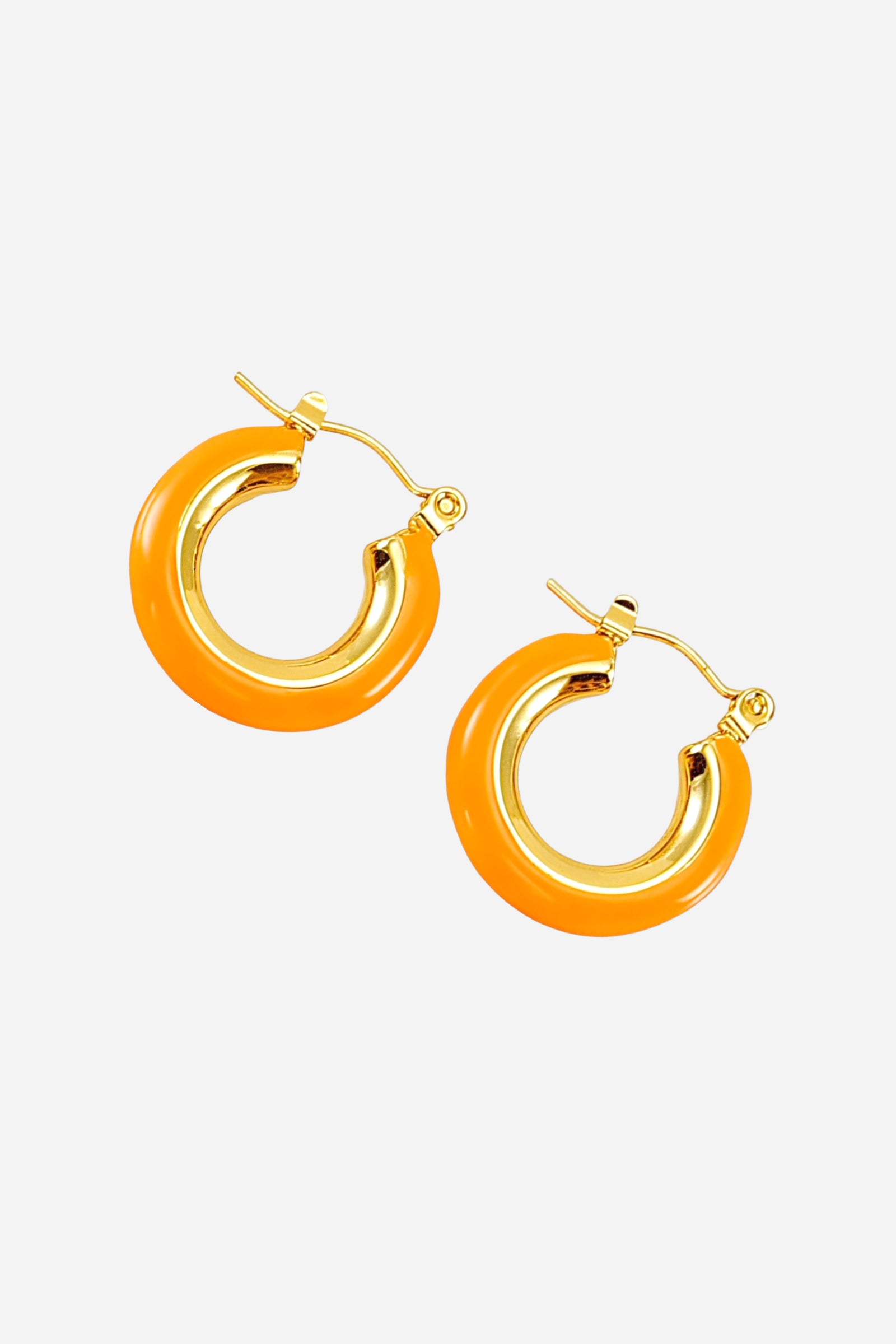 Angled top view of orange enamel hoop earrings with a glossy finish, crafted from stainless steel and plated in polished PVD 18K gold – GLISTIA.