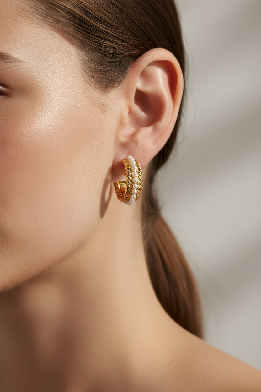 Pearl embellished textured C-hoop earrings crafted from stainless steel with 18K PVD gold plating, featuring twisted rope detailing and imitation pearl accents