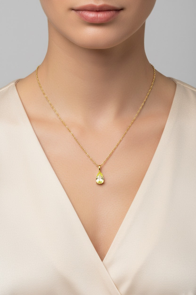 Peridot birthstone necklace for August with green zircon teardrop pendant in 18K PVD gold plated stainless steel