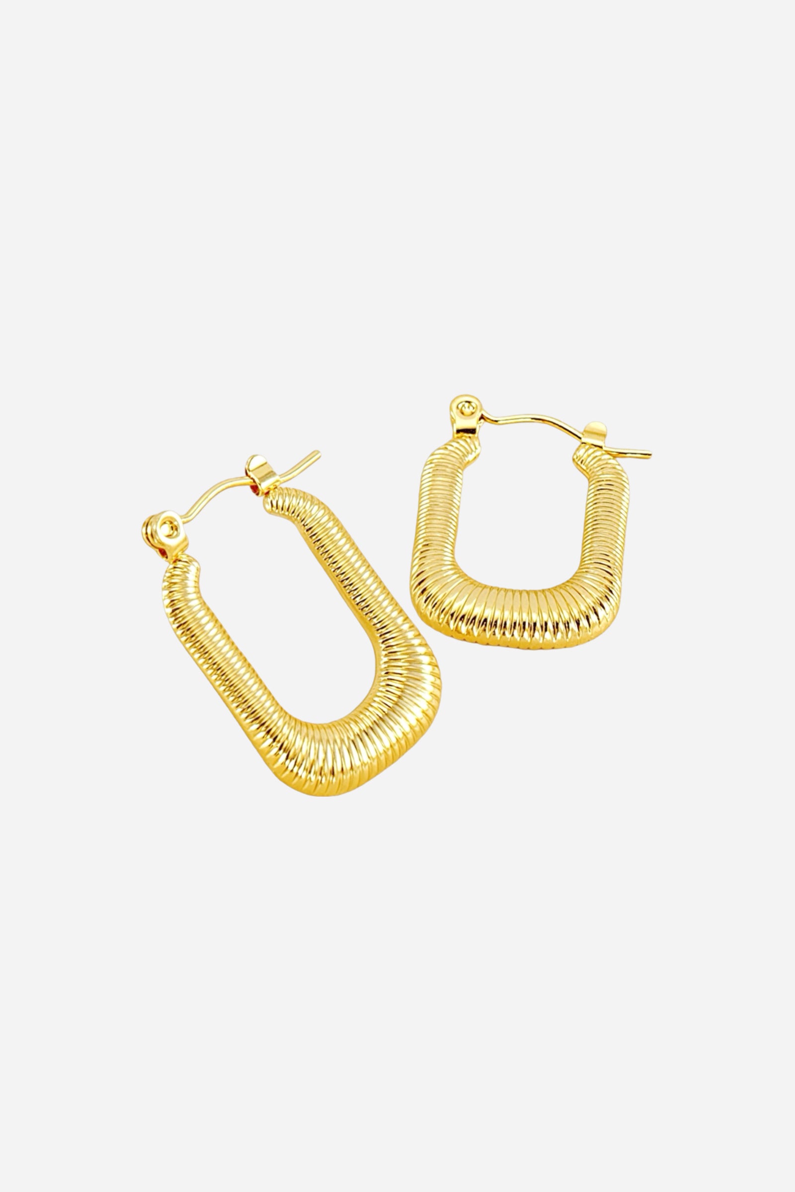 Top view of ribbed rectangle hoop earrings crafted in stainless steel with a polished 18K gold plated finish, showcasing modern ribbed detailing and a sleek geometric design – GLISTIA.