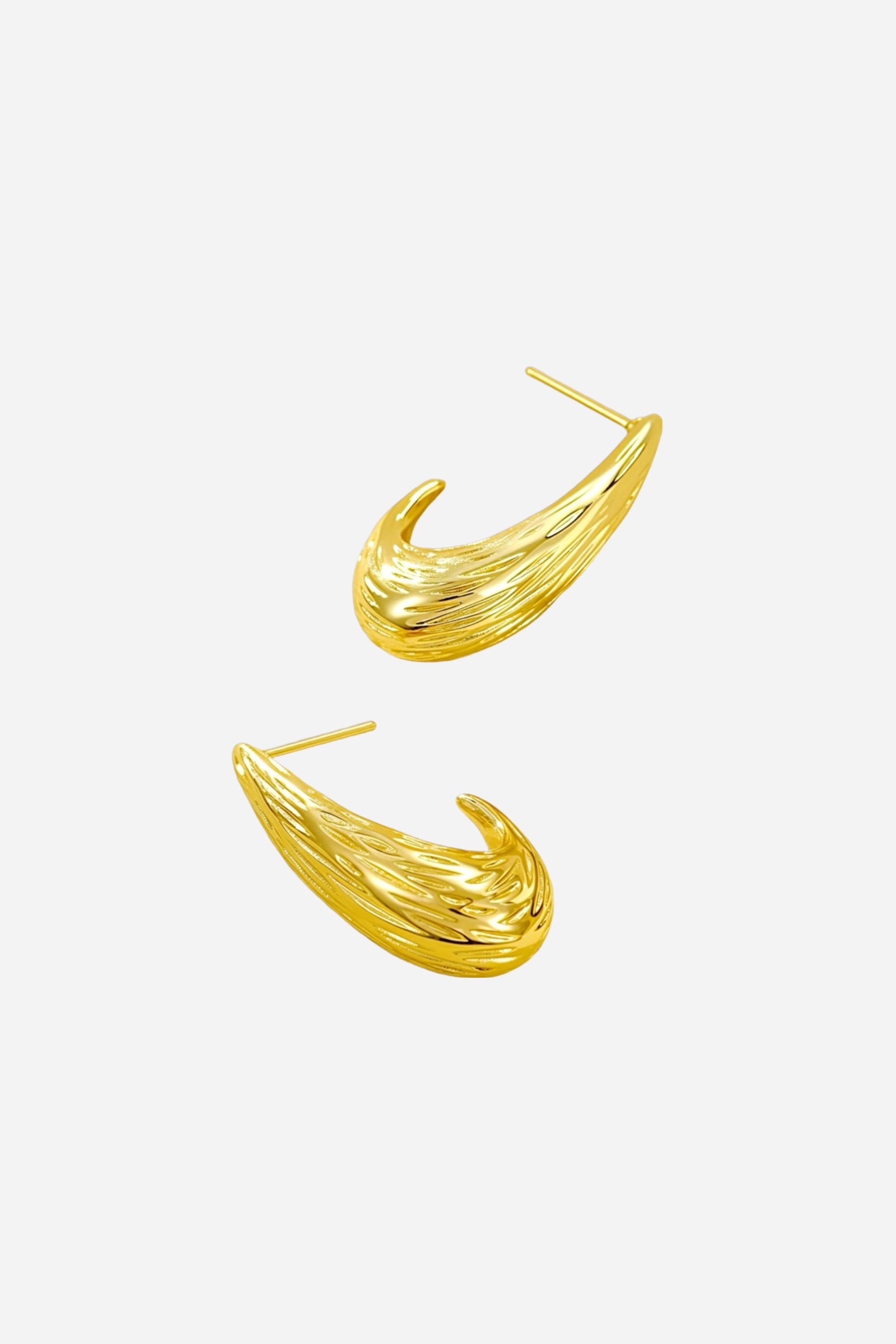 Side view of sculpted teardrop earrings in 18K gold plated stainless steel with intricate textured detailing – GLISTIA jewellery