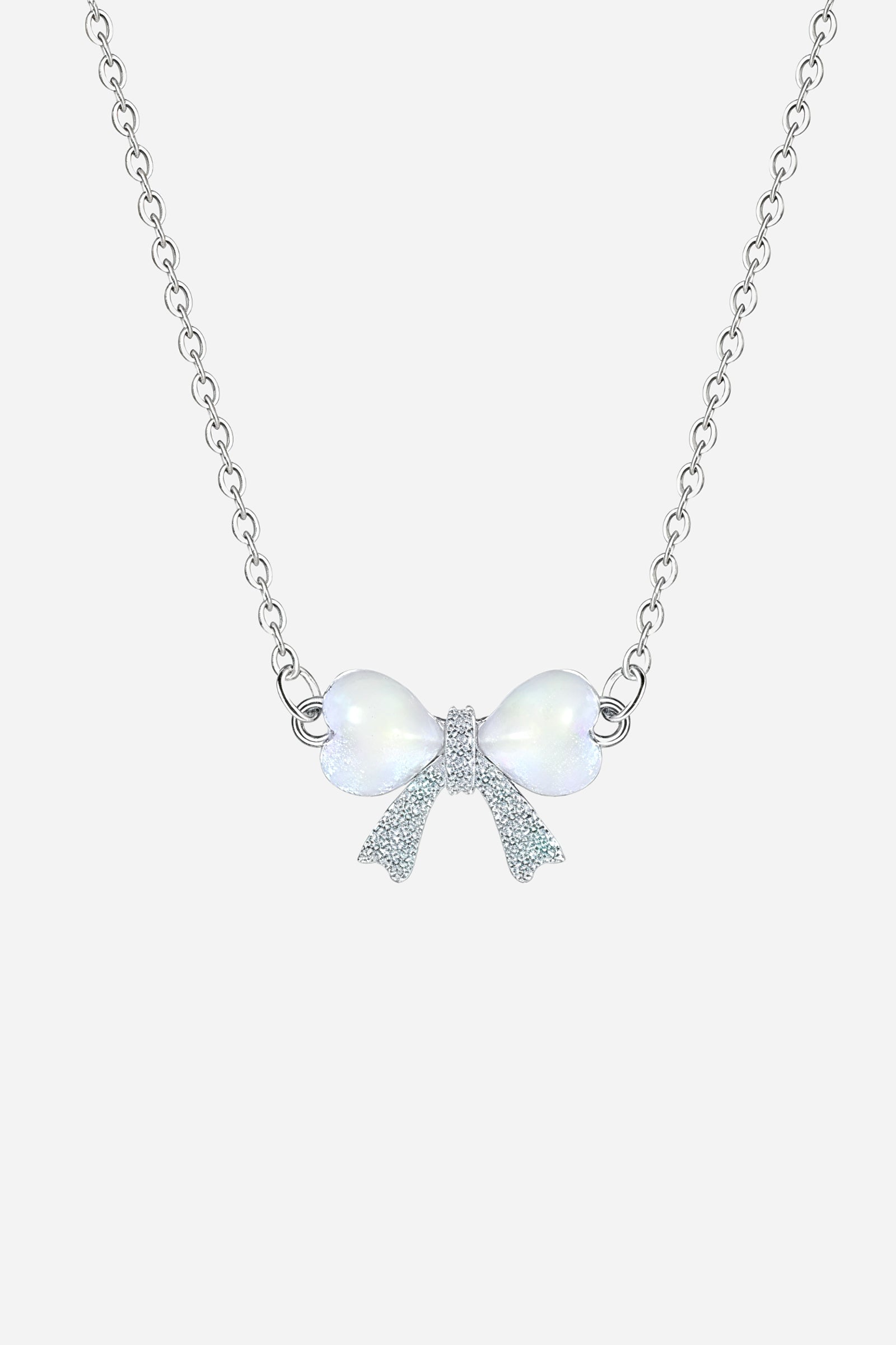Silver bow necklace with heart-shaped details on stainless steel chain – GLISTIA