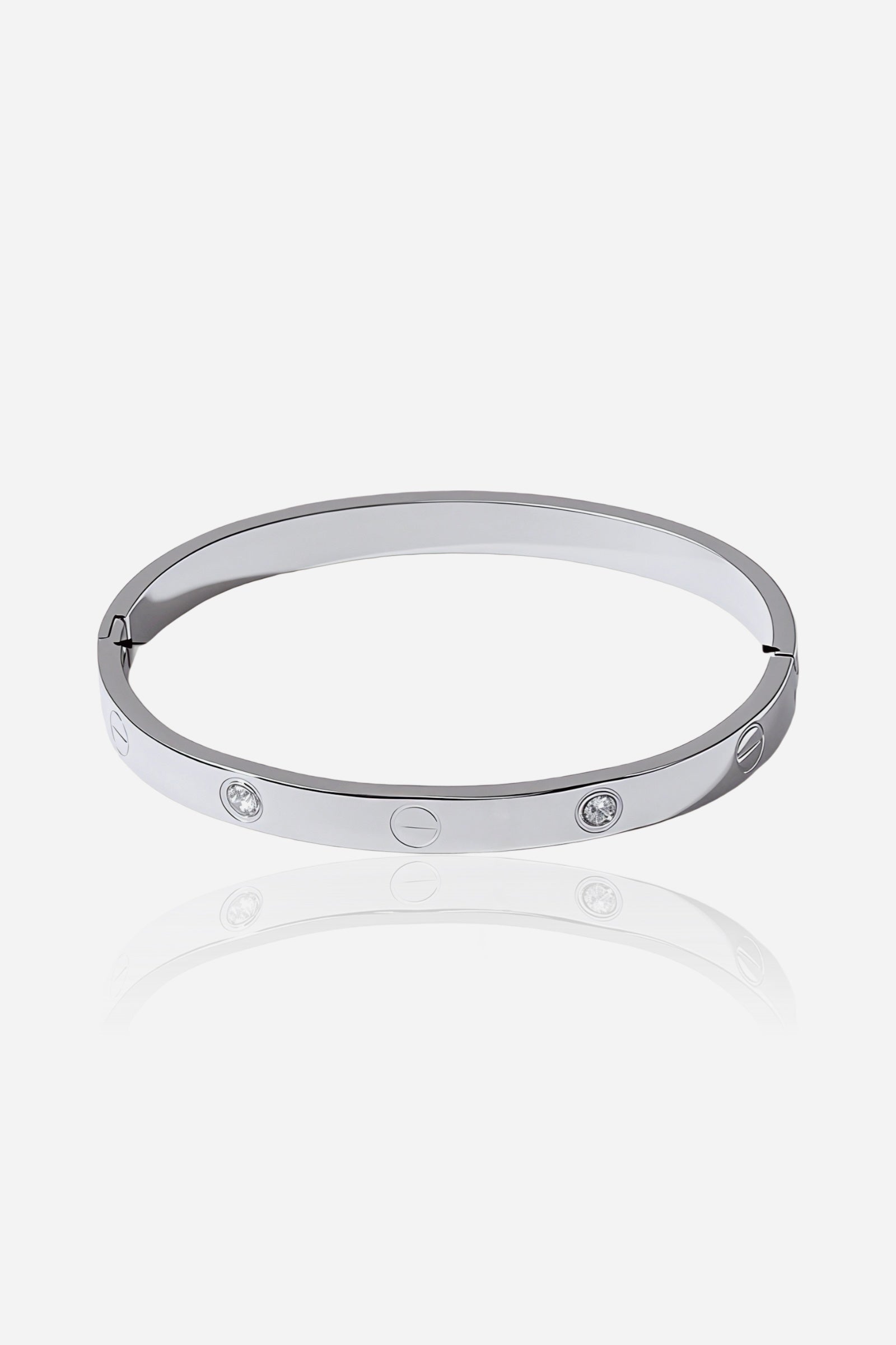 Front view of the Silver Screw & Crystal Bangle in polished stainless steel with alternating screw and crystal inlays – GLISTIA.