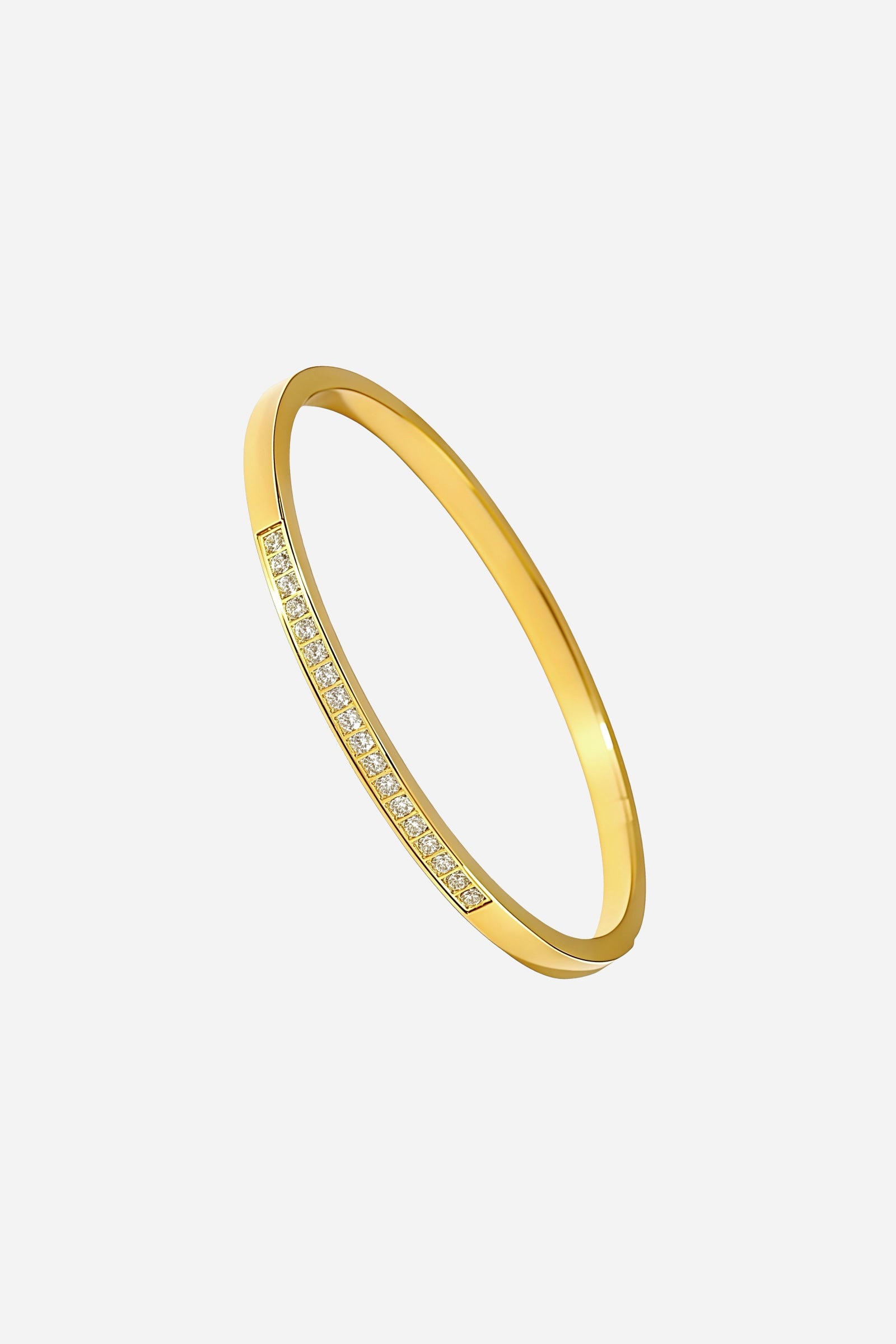Top view of the slim gold bangle with a delicate front crystal channel set in polished stainless steel - GLISTIA.