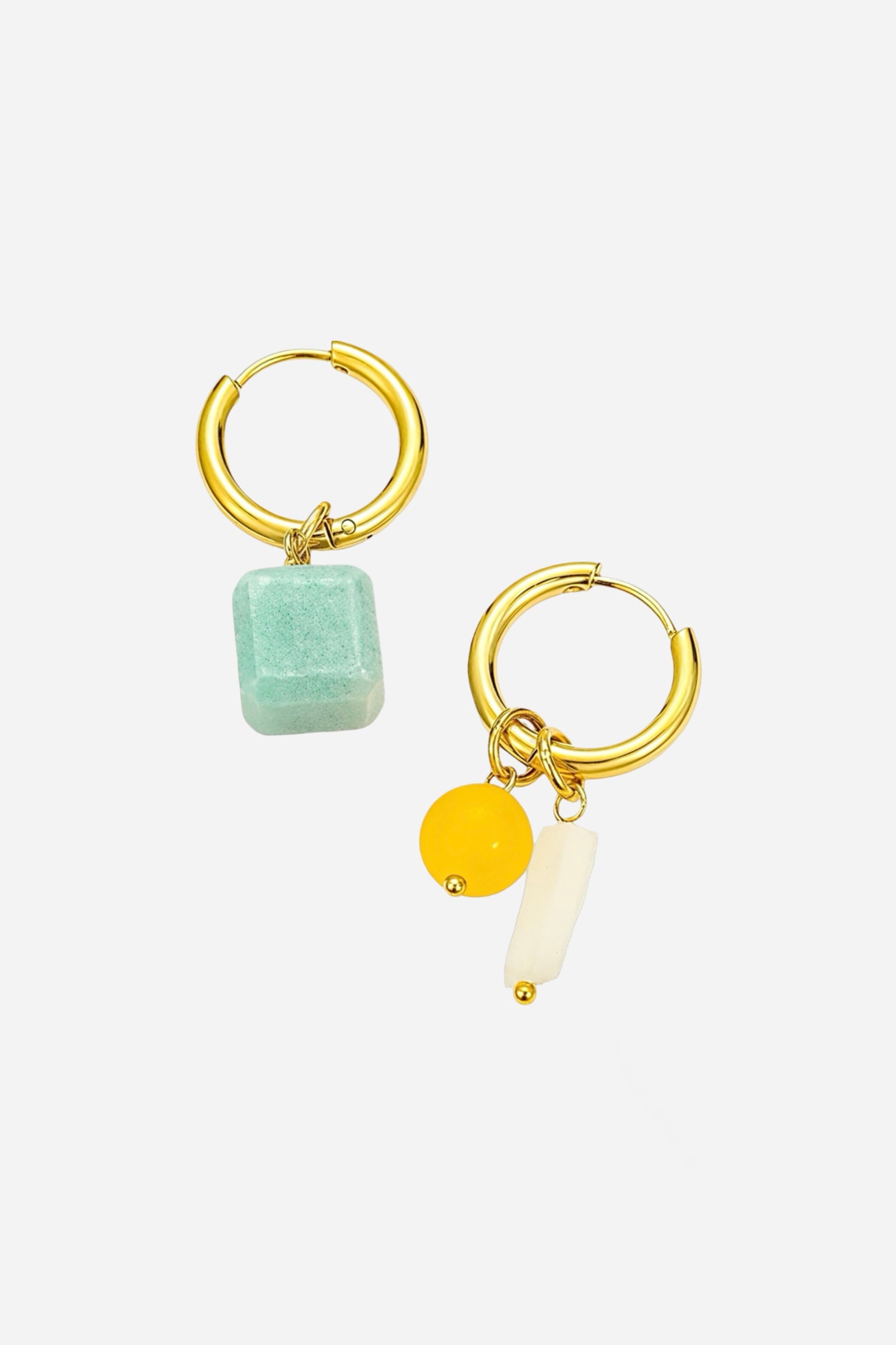 Solara charm hoop drop earrings crafted from stainless steel with a radiant 18K PVD gold plated finish, featuring mismatched charms in turquoise, amber, and ivory tones - GLISTIA.