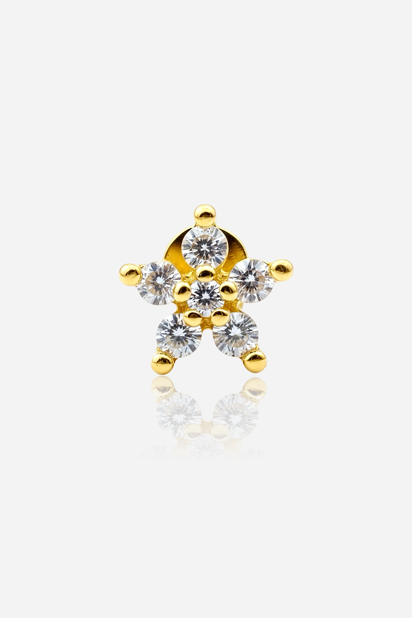 Star crystal flat-back piercing earring in PVD 18K gold plated stainless steel – front view by GLISTIA.