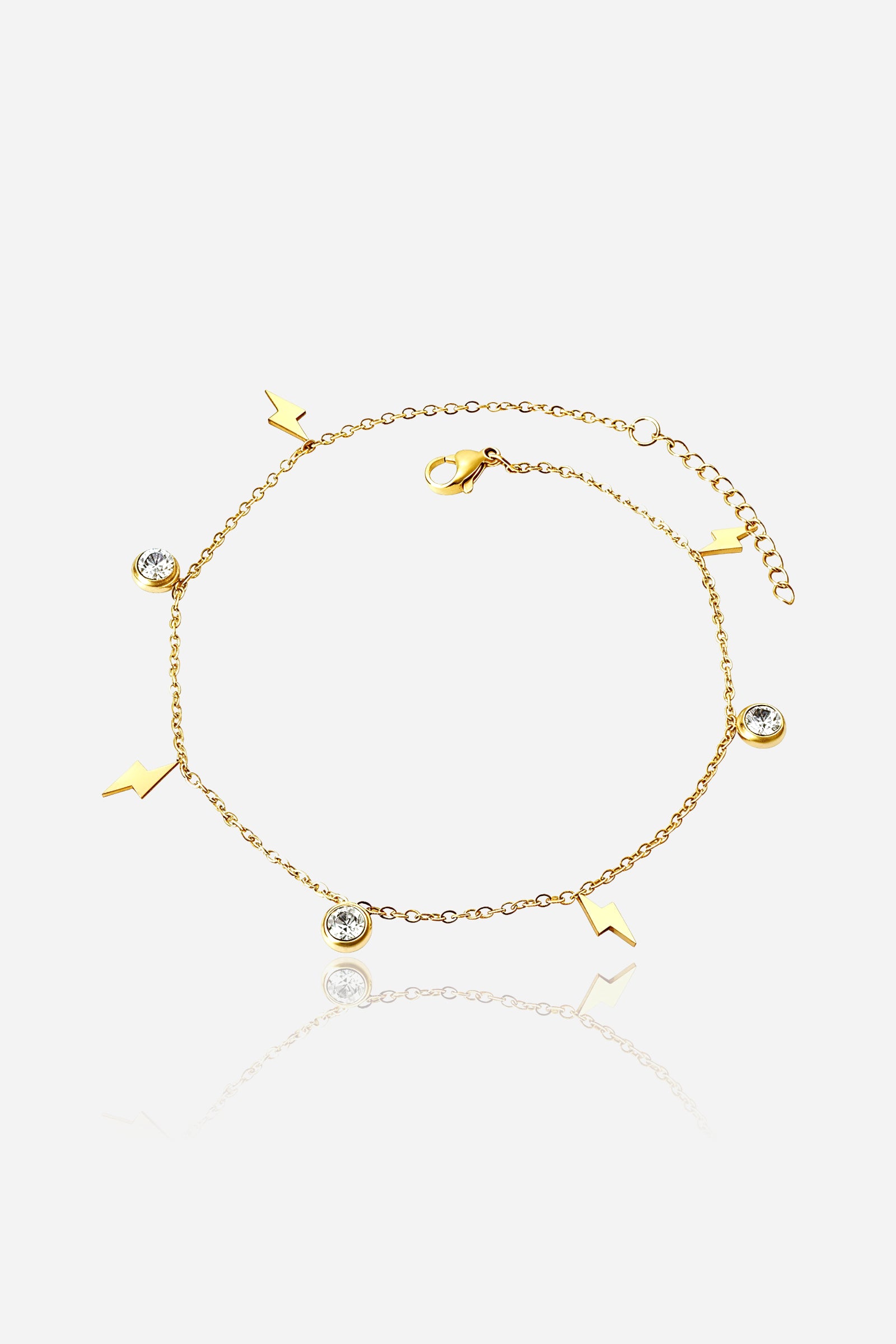Top view of the gold Starlight anklet featuring alternating star and crystal charms along the chain – GLISTIA.