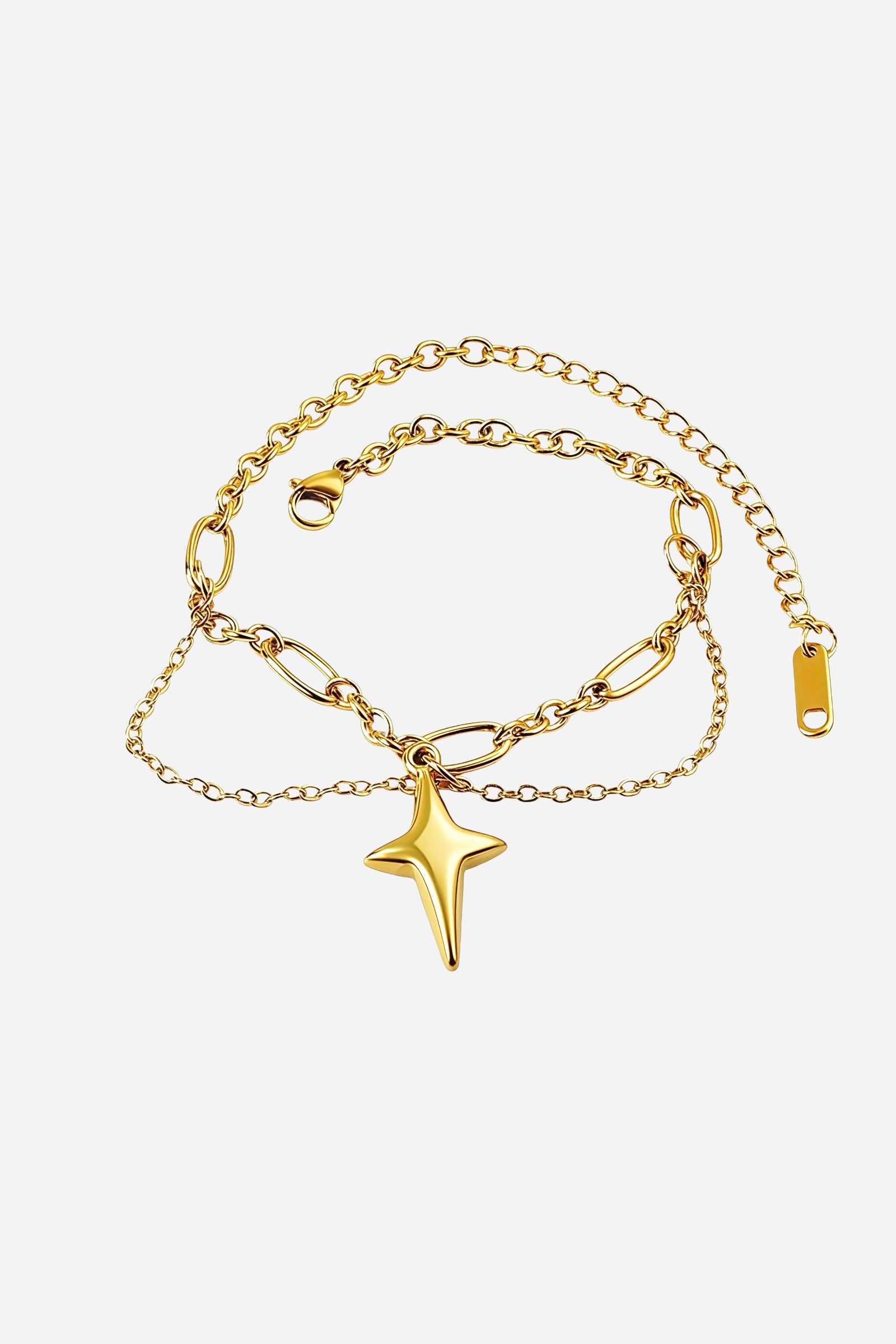 Top-view of GLISTIA’s Stellar bracelet featuring dual gold chains with a sleek modern cross pendant.