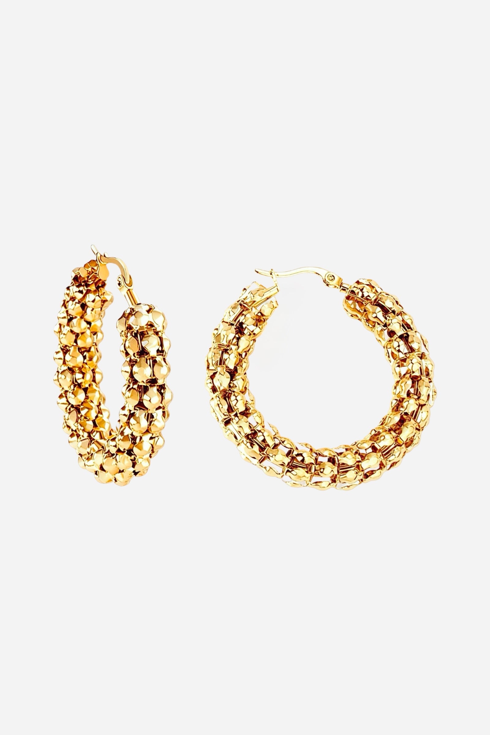 Close-up of textured bubble hoop earrings crafted from stainless steel with a lustrous PVD 18K gold plated finish, featuring a rounded interlinked bead pattern for a bold, dimensional look – GLISTIA.