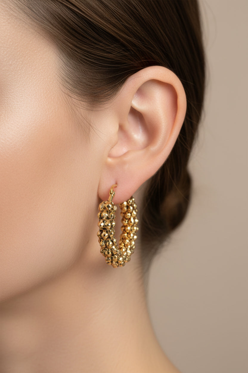 Front view of textured bubble hoop earrings in 18K PVD gold plated stainless steel