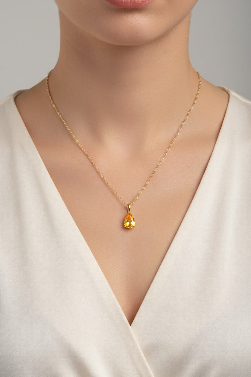 Topaz birthstone necklace for November with golden zircon teardrop pendant in 18K PVD gold plated stainless steel