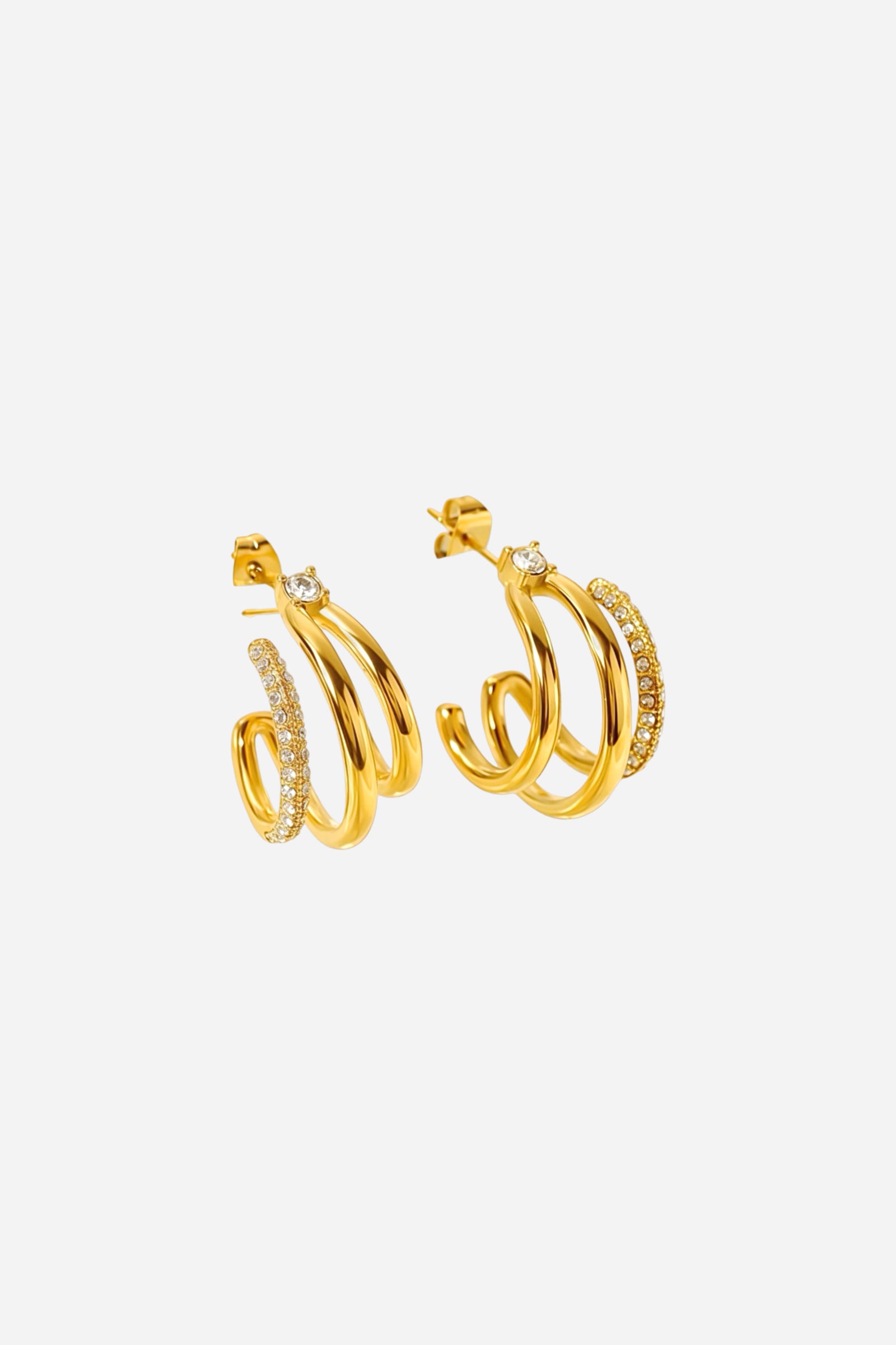 Side view of triple row crystal hoop earrings in 18K gold plated stainless steel featuring pavé crystal accents and layered hoop design – GLISTIA jewellery