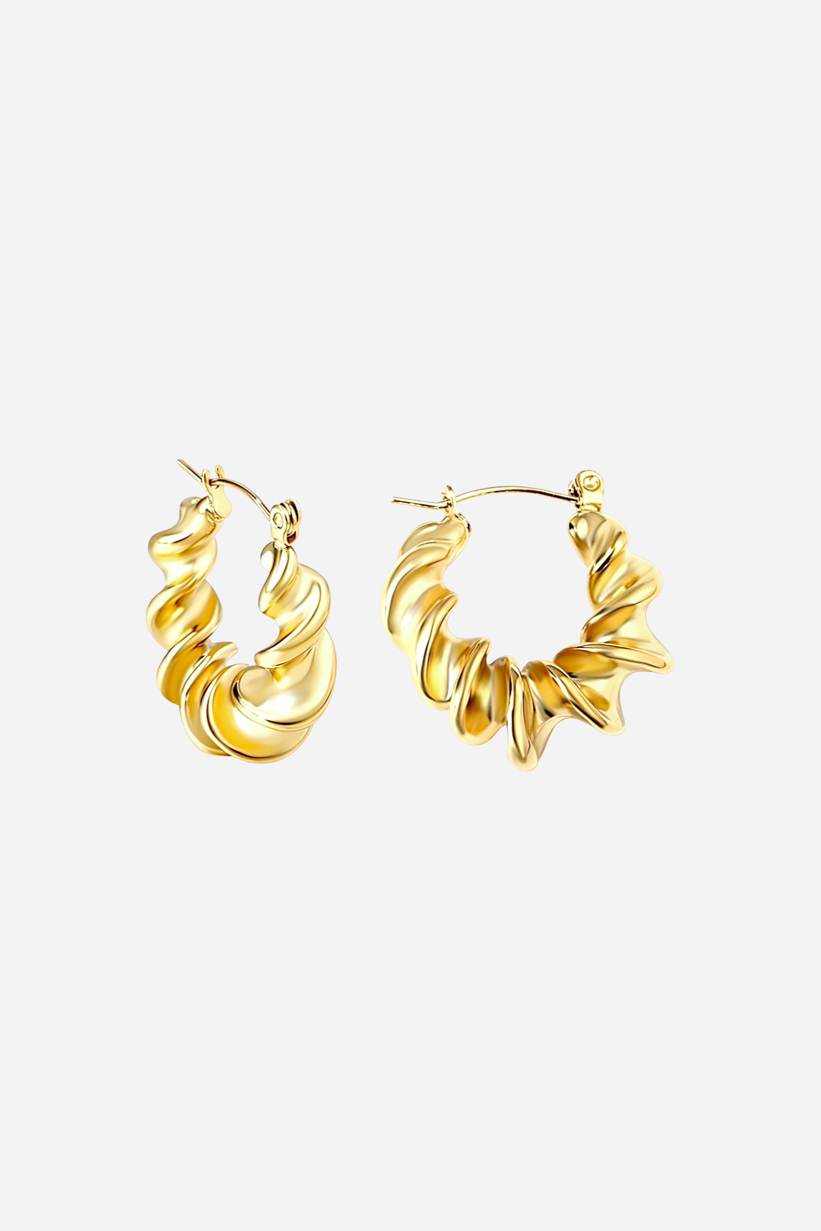 Side view of bold twist design hoop earrings crafted in 18K gold plated stainless steel with sculptural spiral detailing – GLISTIA jewellery