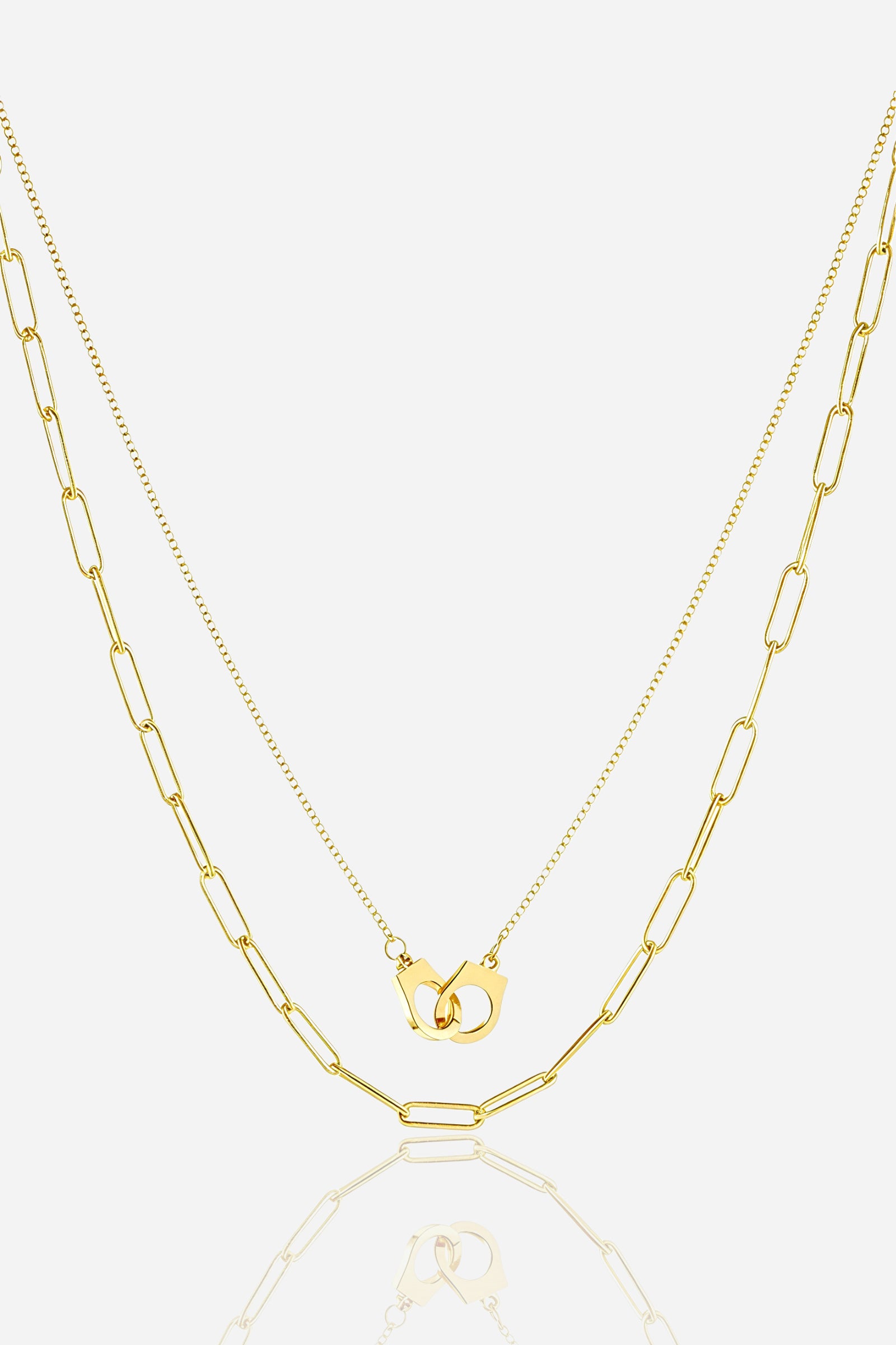 Front view of GLISTIA Unity Handcuff Layered Necklace with double gold chains.