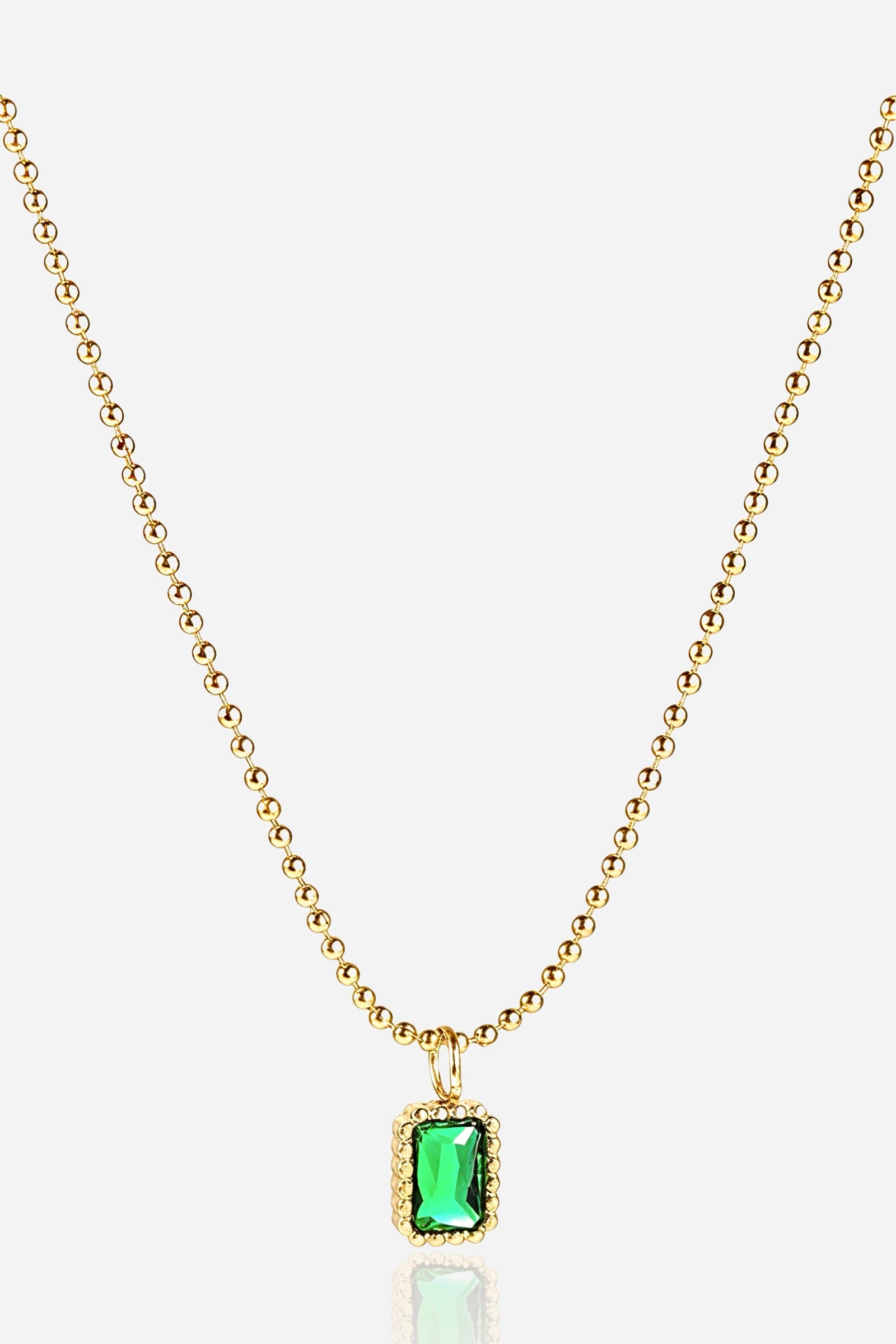 Zoom-view image of GLISTIA Verdantia Gem Necklace showcasing the 18K PVD gold plated ball chain and green gemstone pendant.