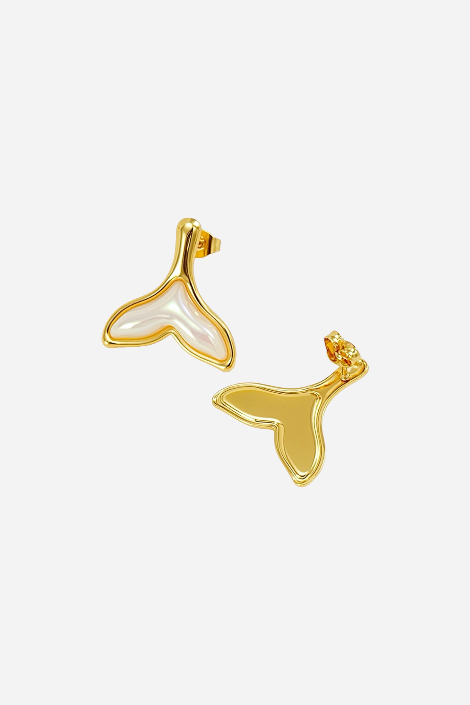 Angled view of Whale Tail Stud Earrings crafted from stainless steel with lustrous PVD 18K gold plating, featuring a pearlescent resin inlay that enhances the ocean-inspired design – GLISTIA.