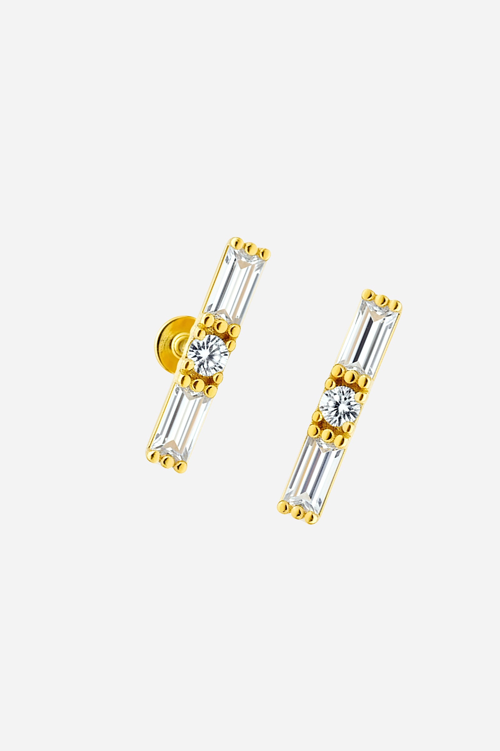 Minimal baguette zircon piercing stud in PVD 18K gold plated finish- GLISTIA